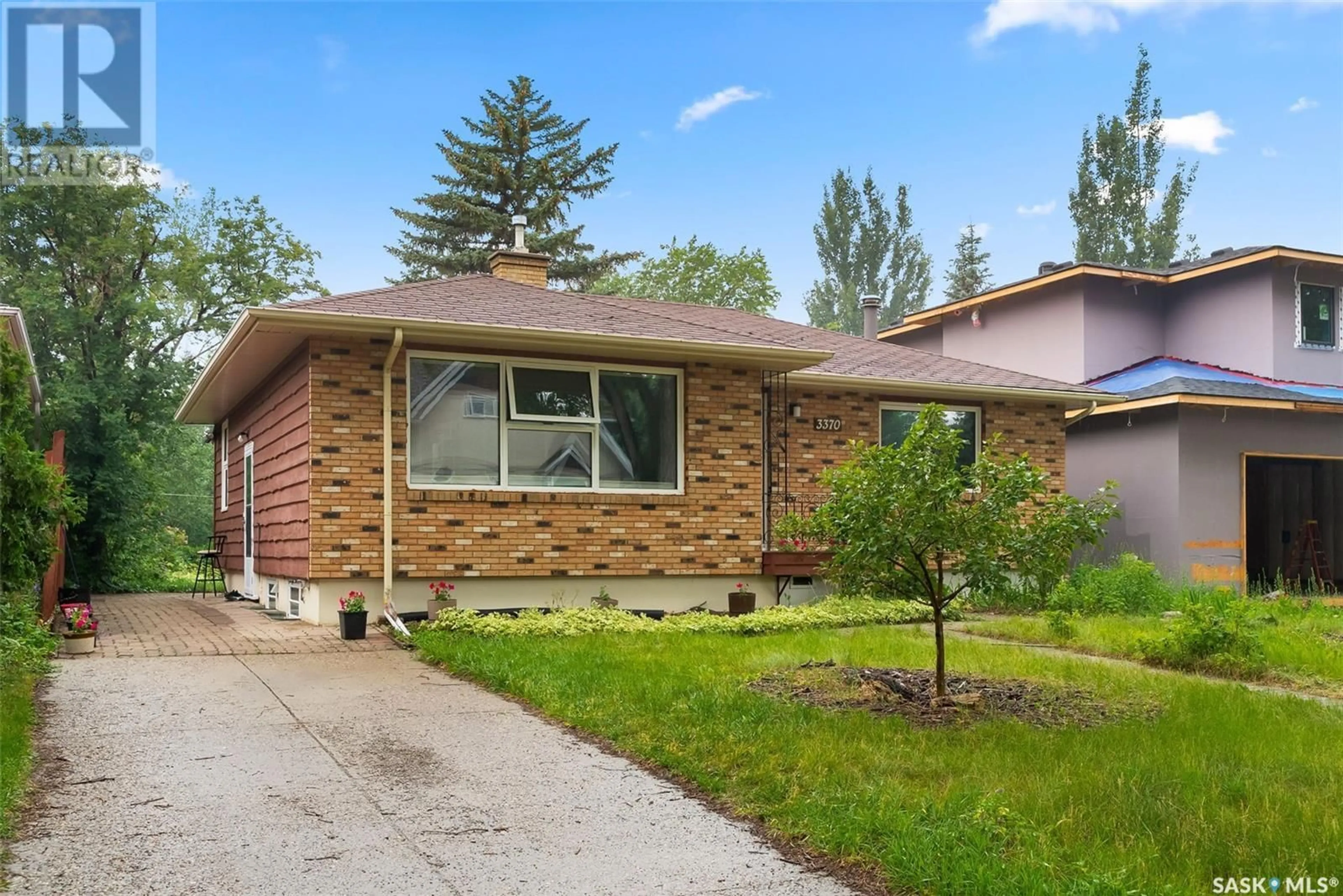 Home with brick exterior material, street for 3370 RAE STREET, Regina Saskatchewan S4S1S4