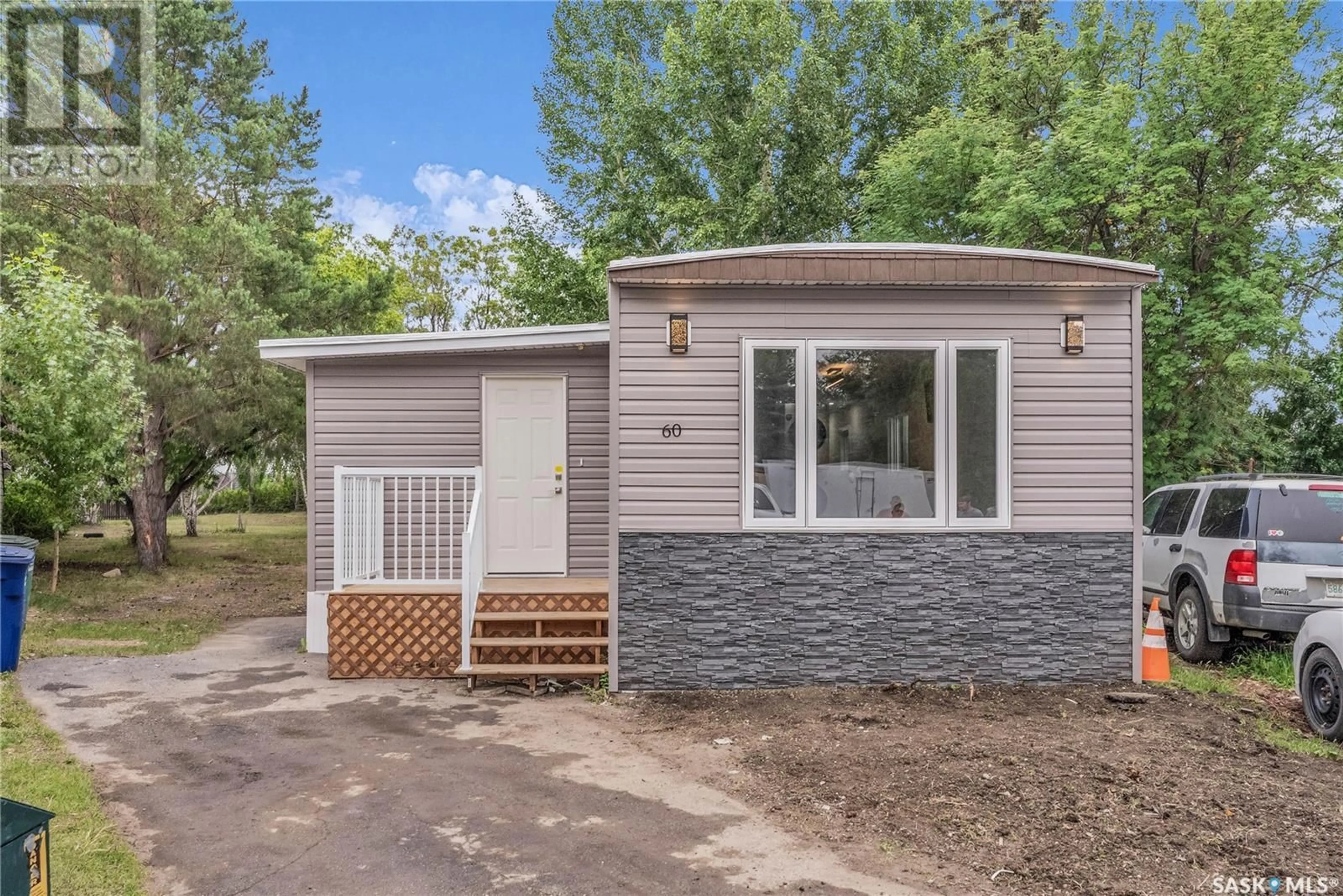 Home with vinyl exterior material, street for 60 1035 BOYCHUK DRIVE, Saskatoon Saskatchewan S7H5B2