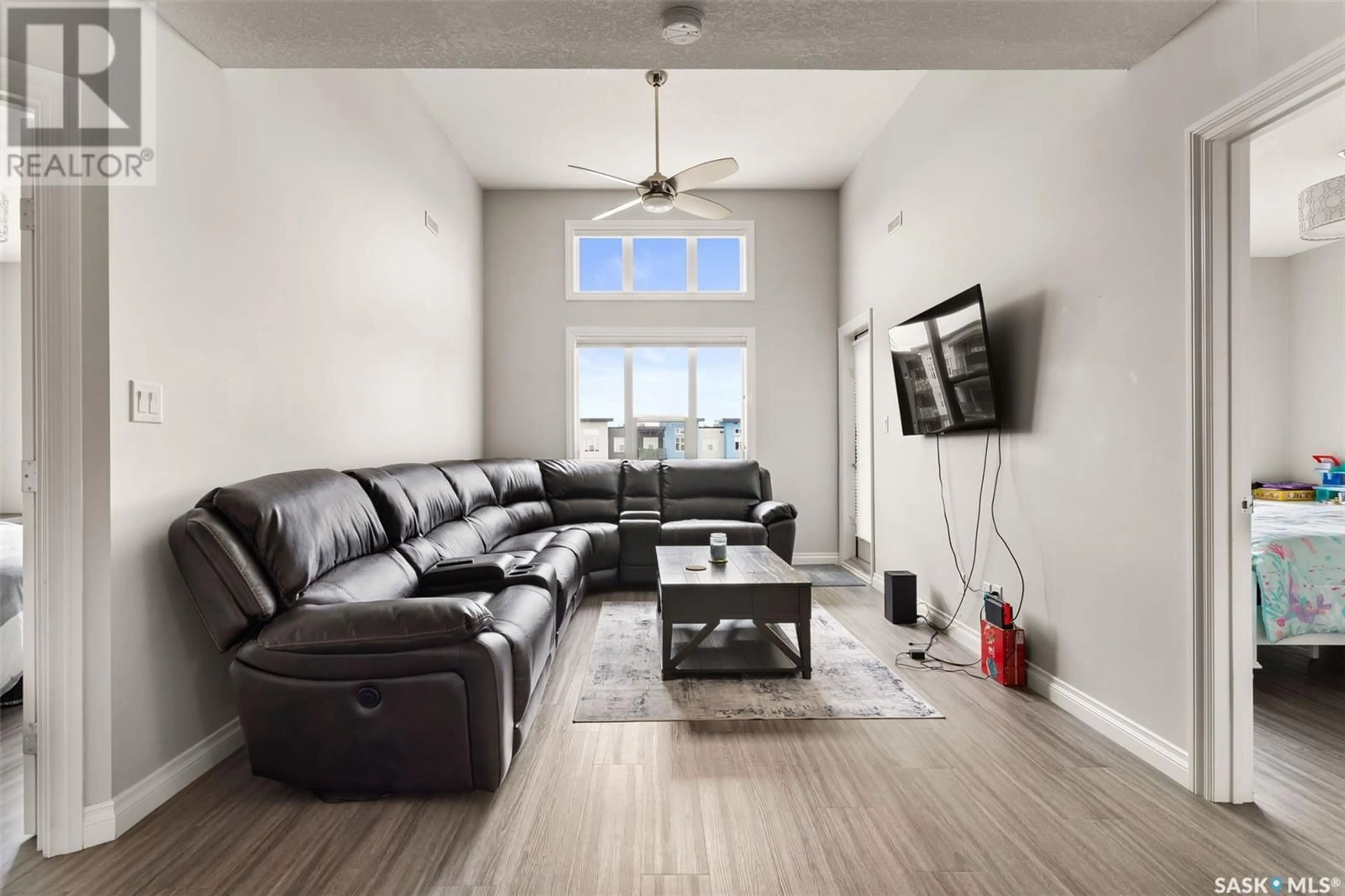 Living room with furniture, unknown for 5303 - 425 UNIVERSAL CRESCENT, Regina Saskatchewan S4W0L1