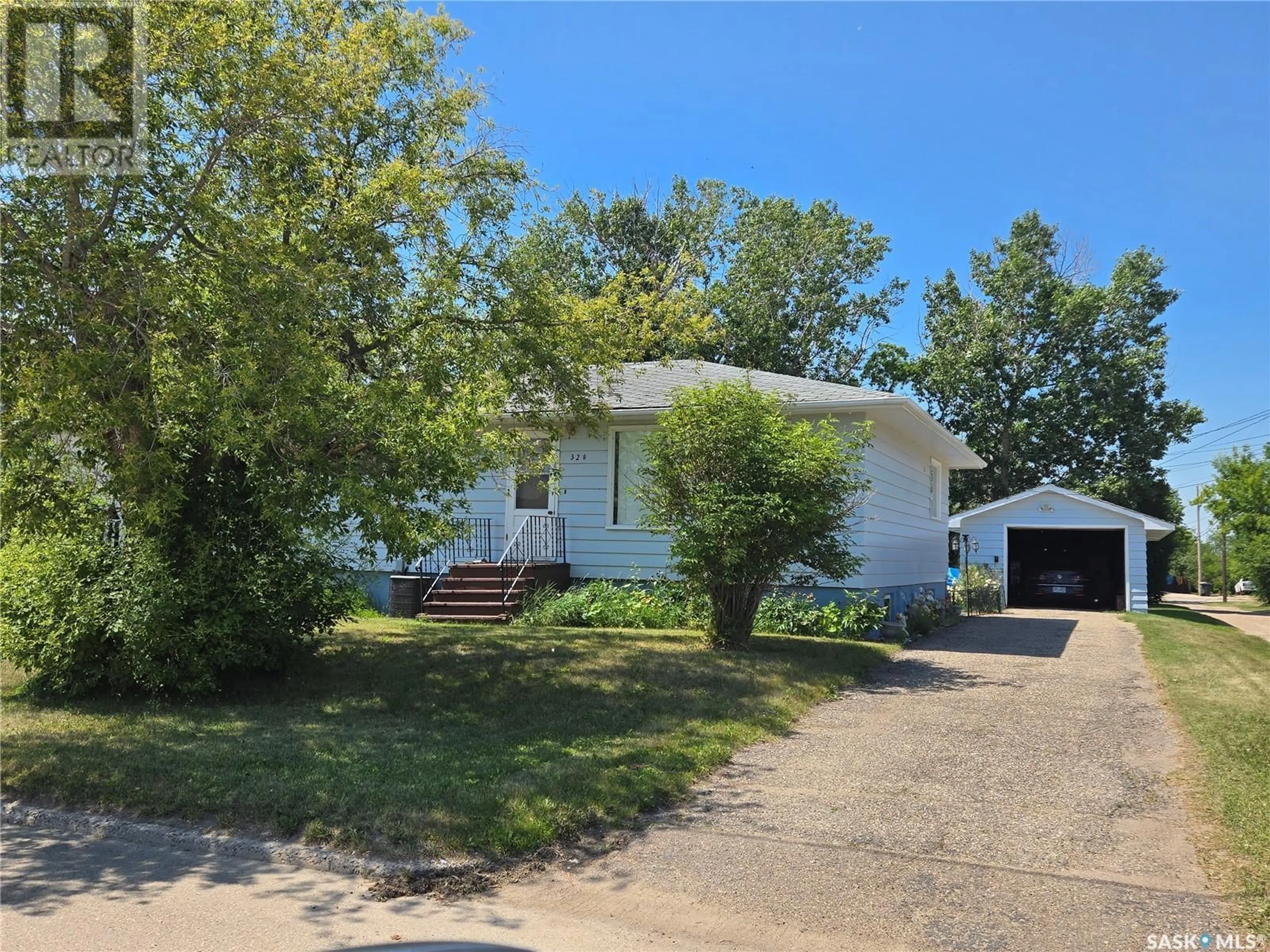 A pic from outside/outdoor area/front of a property/back of a property/a pic from drone, street for 324 SULLIVAN STREET, Stoughton Saskatchewan S0G4T0