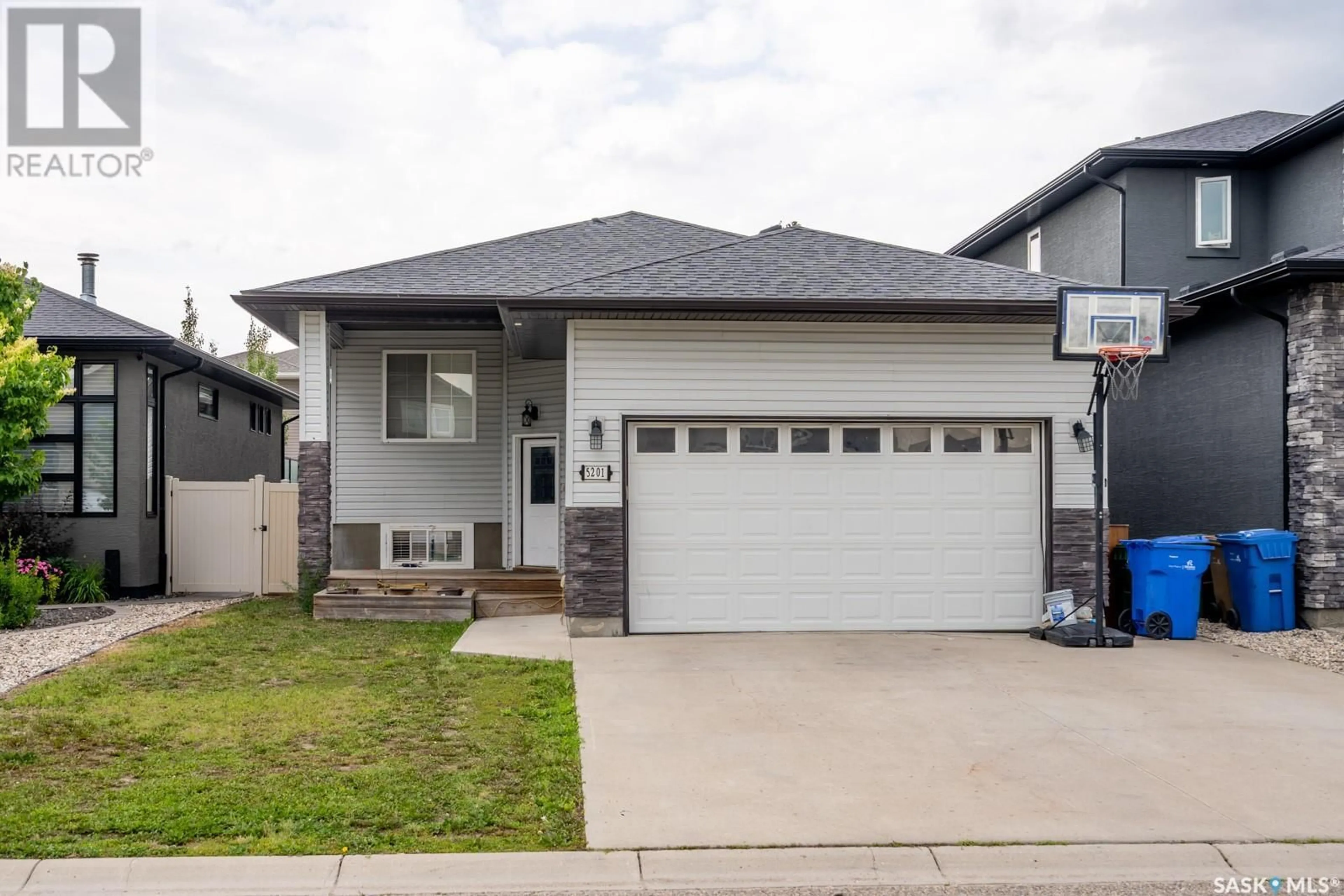 Home with vinyl exterior material, street for 5201 AVIATOR CRESCENT, Regina Saskatchewan S4W0G6