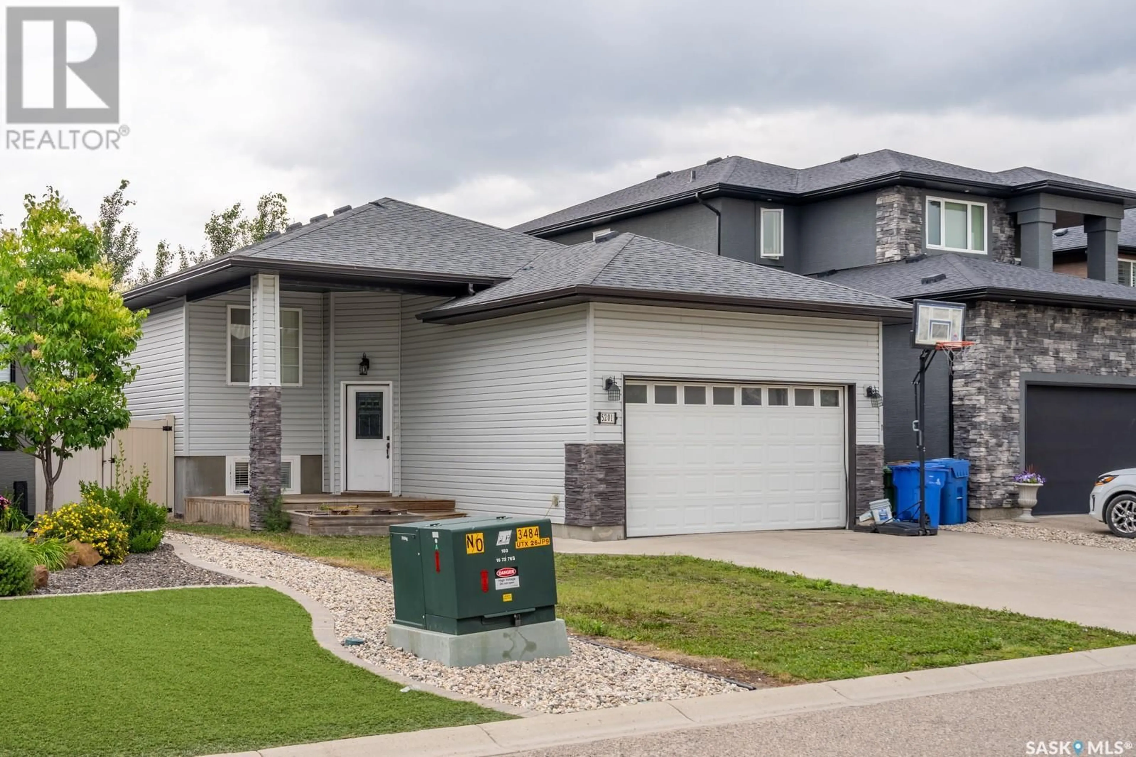 Home with brick exterior material, street for 5201 AVIATOR CRESCENT, Regina Saskatchewan S4W0G6