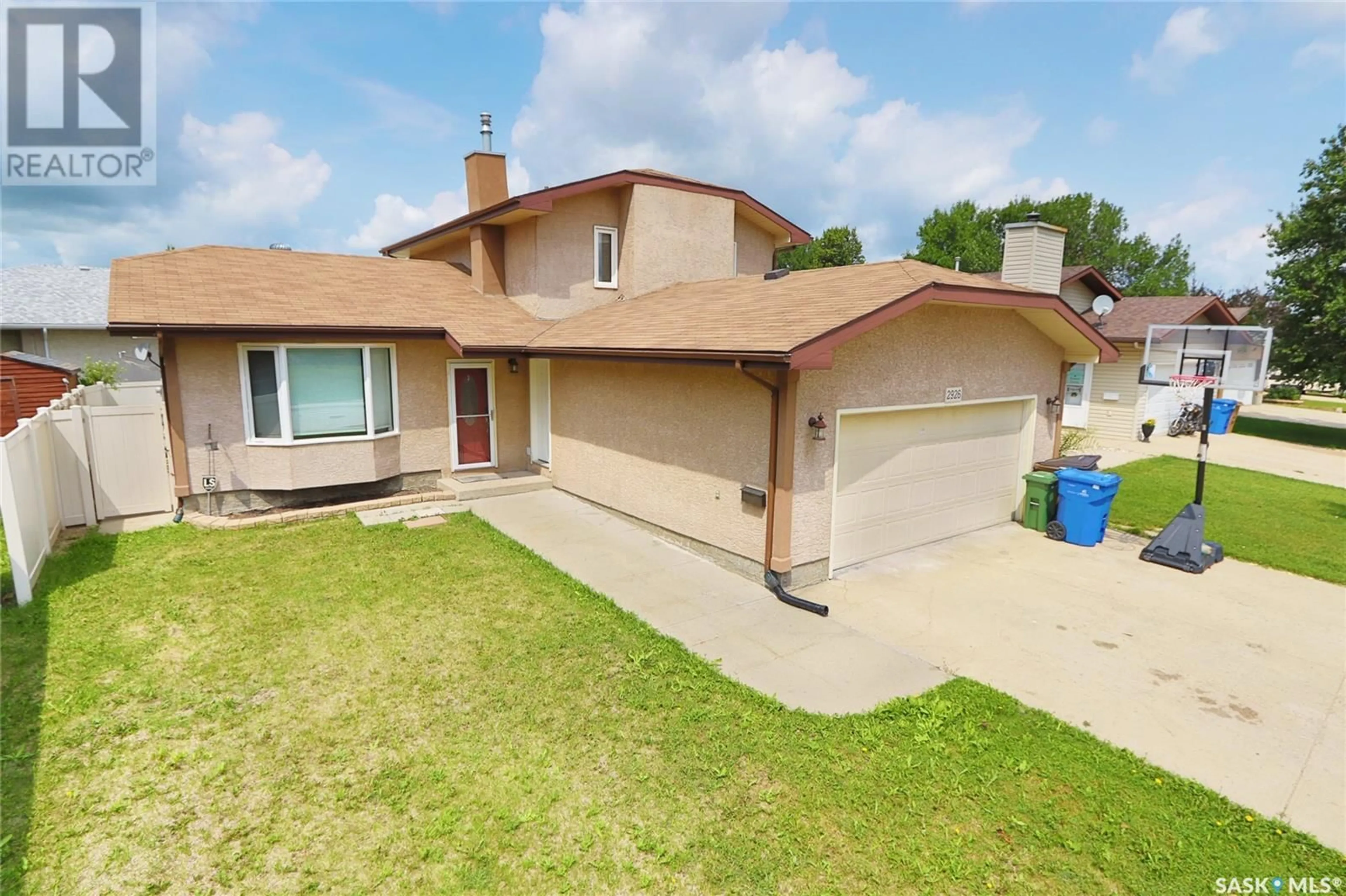A pic from outside/outdoor area/front of a property/back of a property/a pic from drone, street for 2926 PARTRIDGE CRESCENT, Regina Saskatchewan S4R8J5