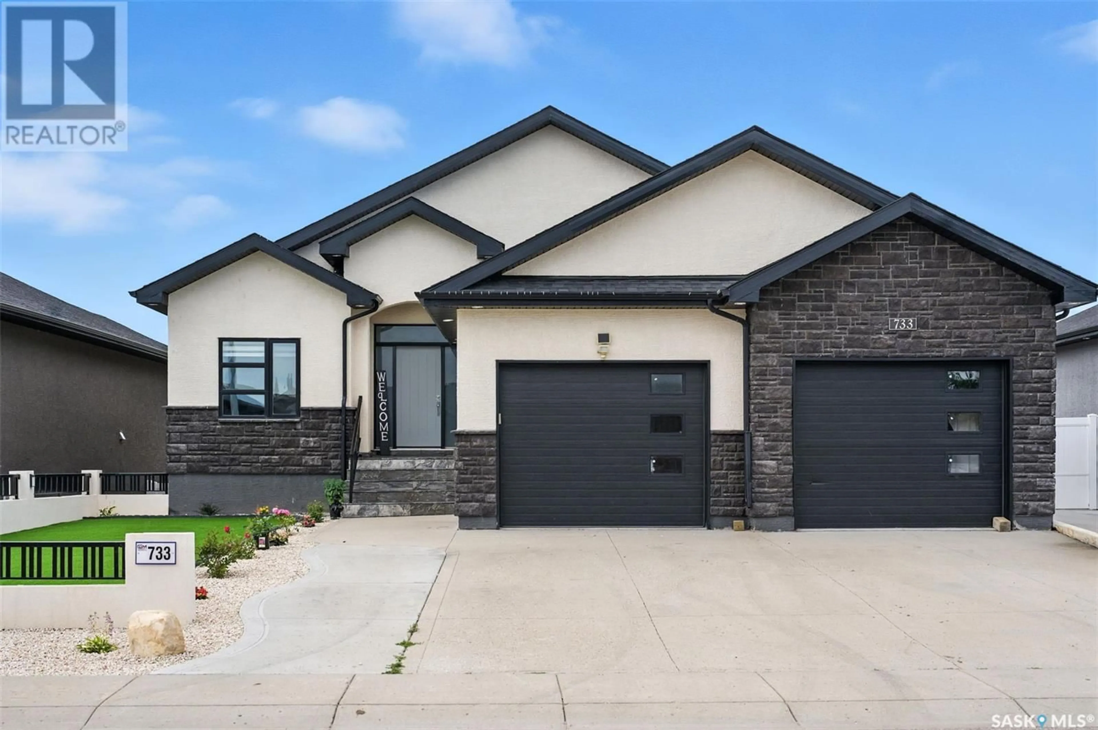 Home with brick exterior material, street for 733 GOWAN ROAD, Warman Saskatchewan S0K4S2