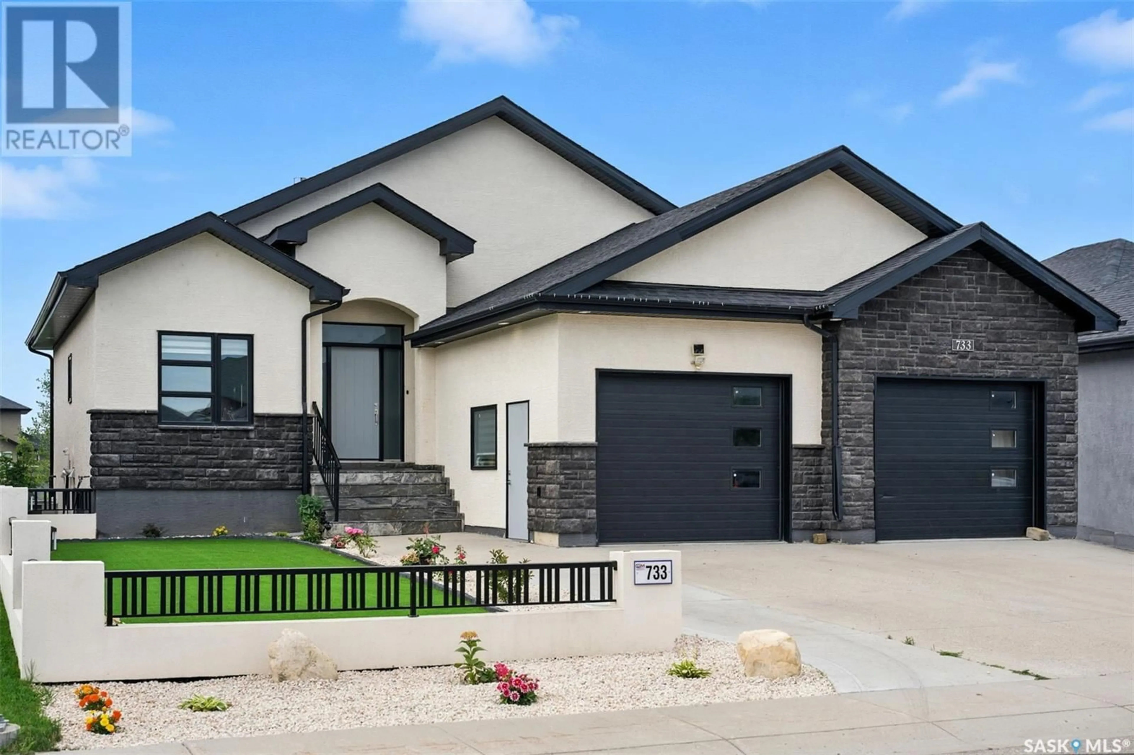 Home with brick exterior material, street for 733 GOWAN ROAD, Warman Saskatchewan S0K4S2