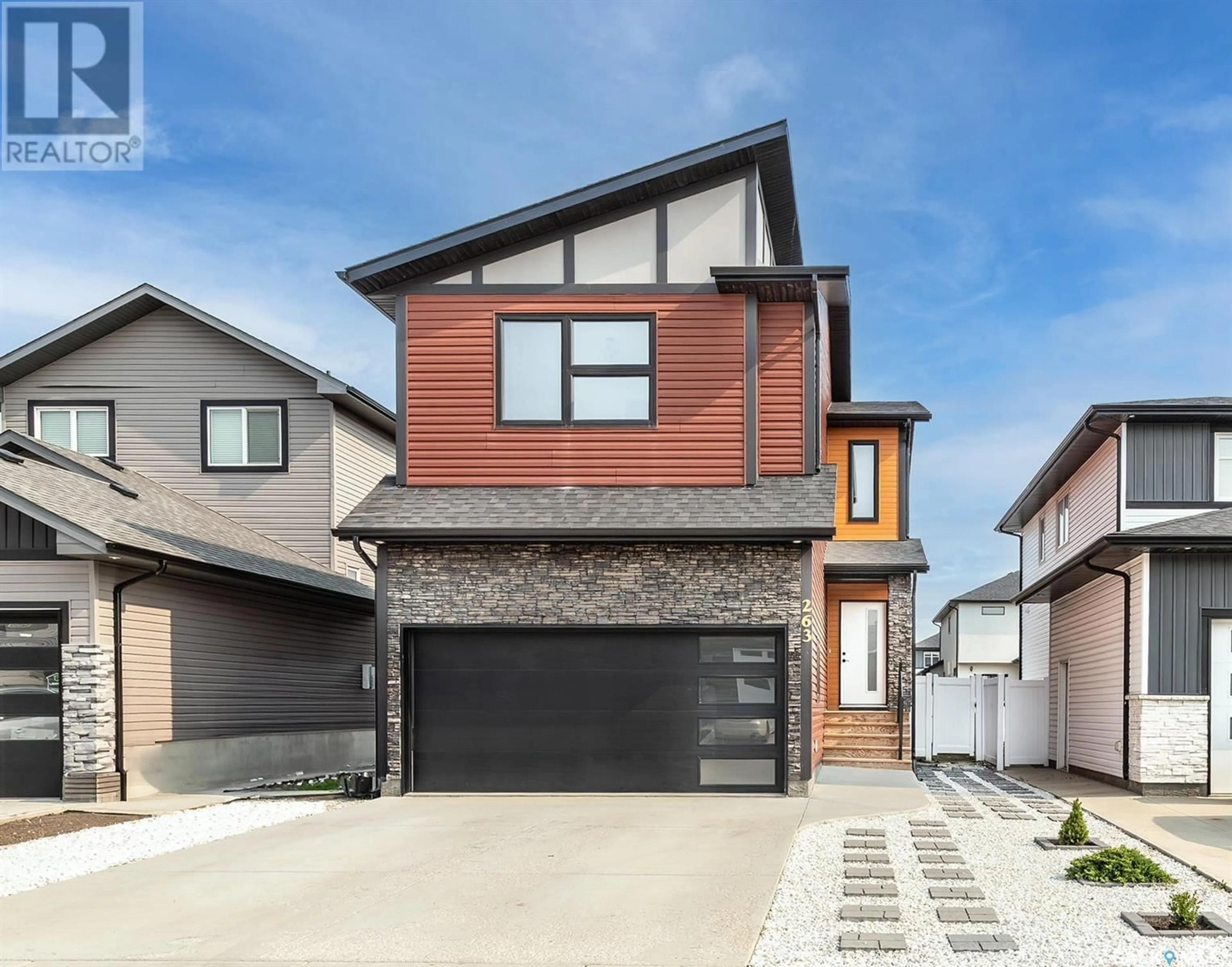 Home with brick exterior material, street for 263 BARRETT STREET, Saskatoon Saskatchewan S7W1C6