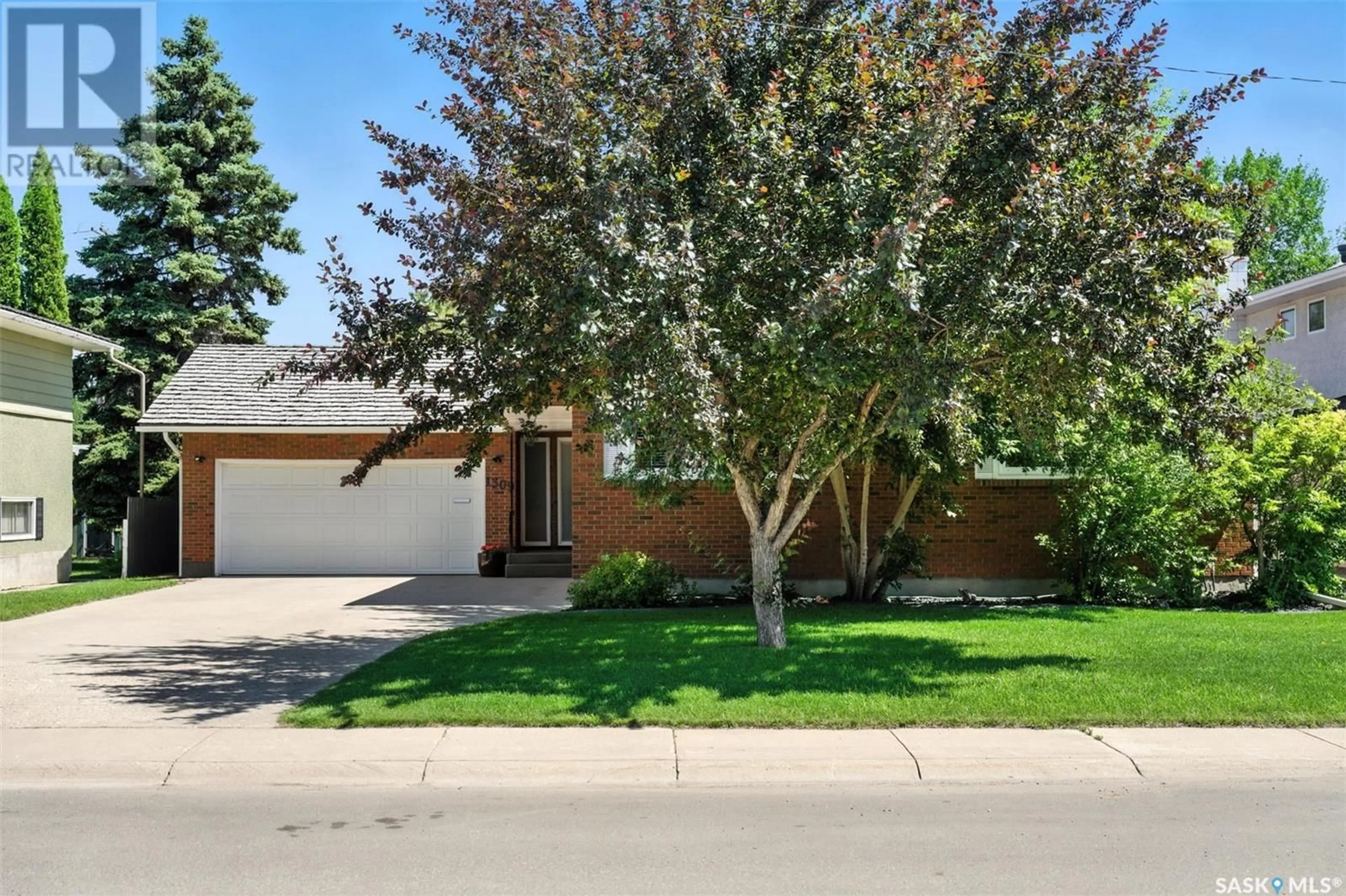 Home with brick exterior material, street for 1309 PARK AVENUE, Saskatoon Saskatchewan S7H2N7