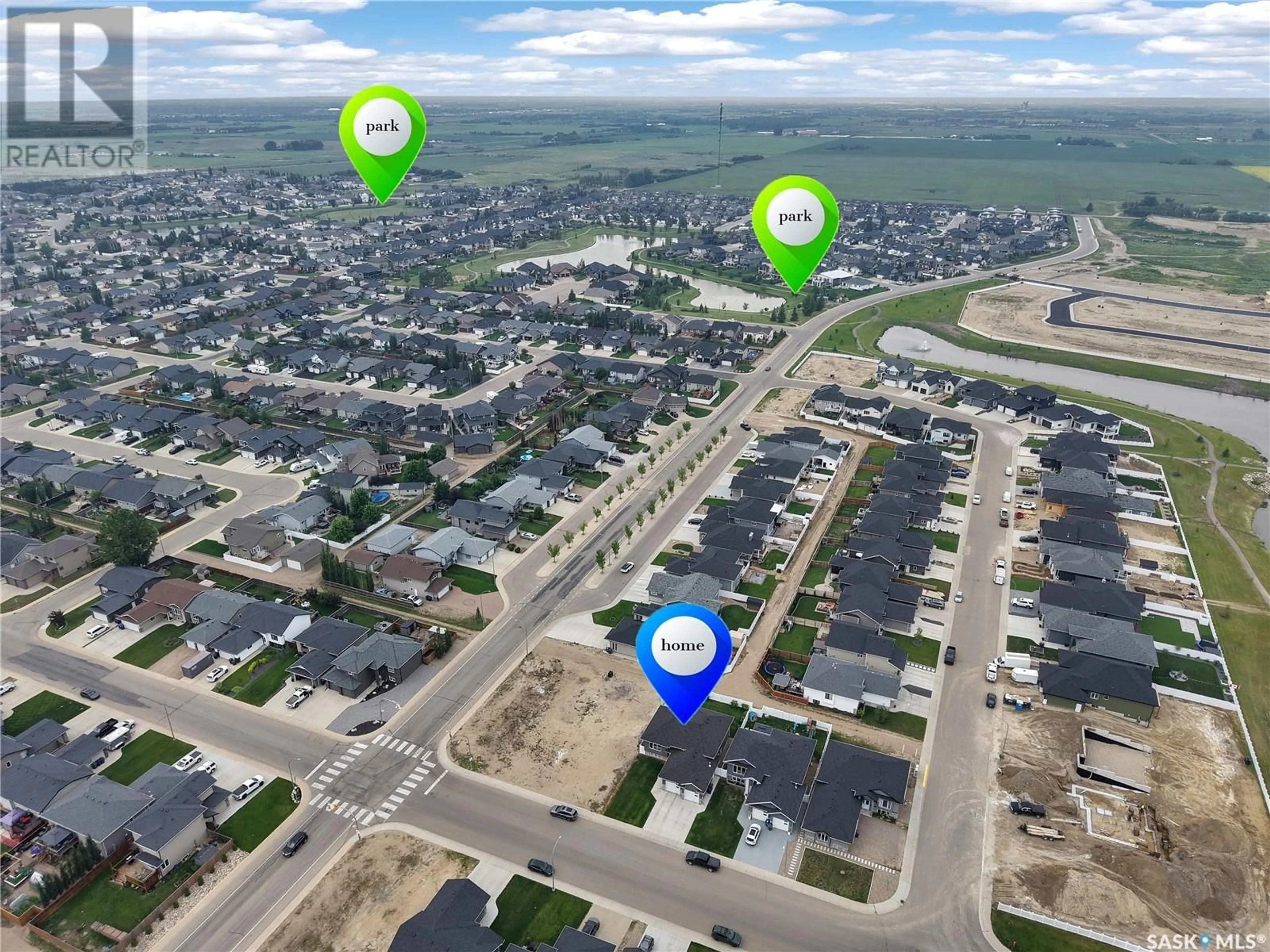 A pic from outside/outdoor area/front of a property/back of a property/a pic from drone, street for 805 1ST AVENUE, Warman Saskatchewan S0K4S5