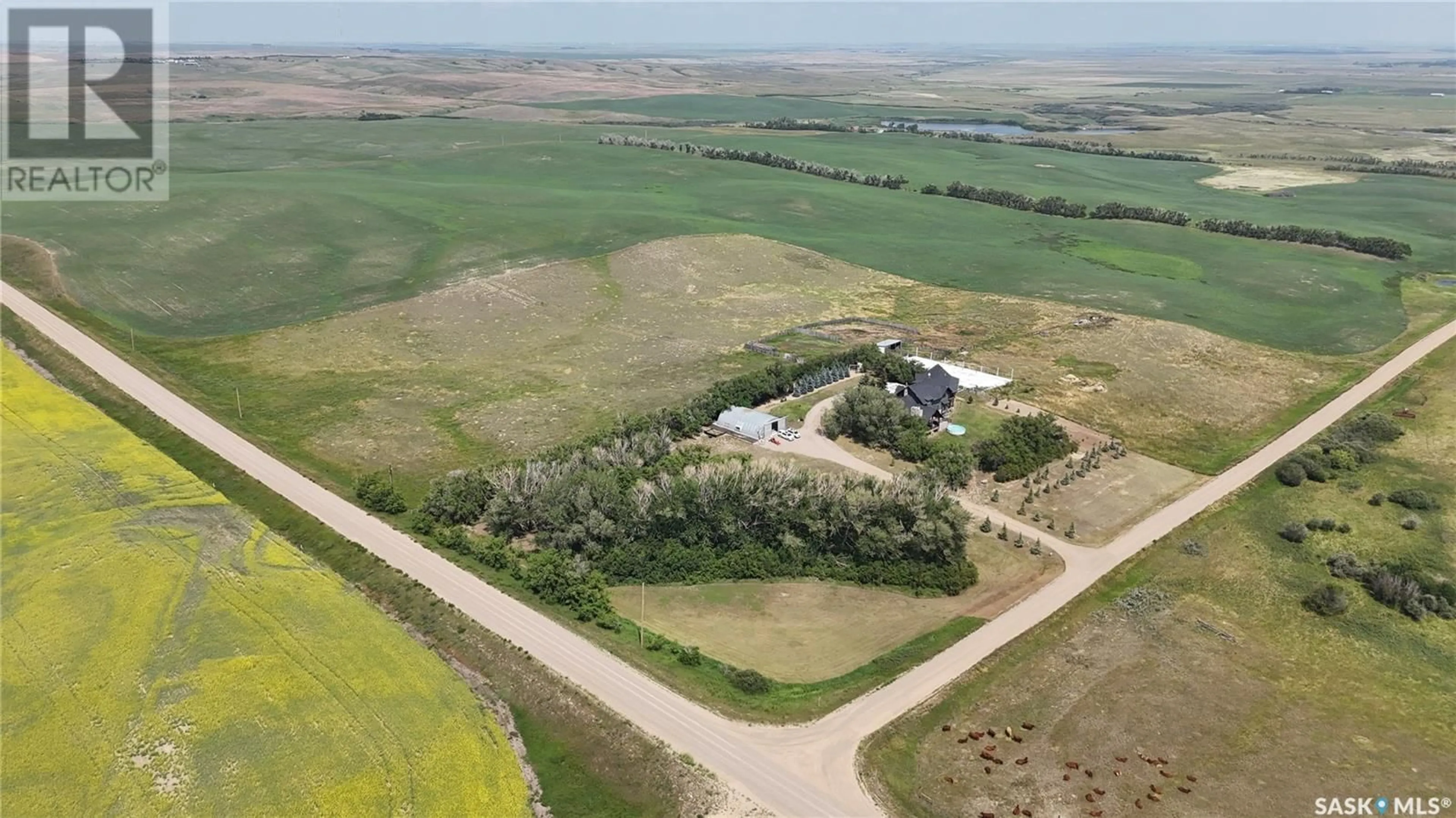 A pic from outside/outdoor area/front of a property/back of a property/a pic from drone, building for #1 HWY ACREAGE HWY, Excelsior Rm No. 166 Saskatchewan S9H4M6