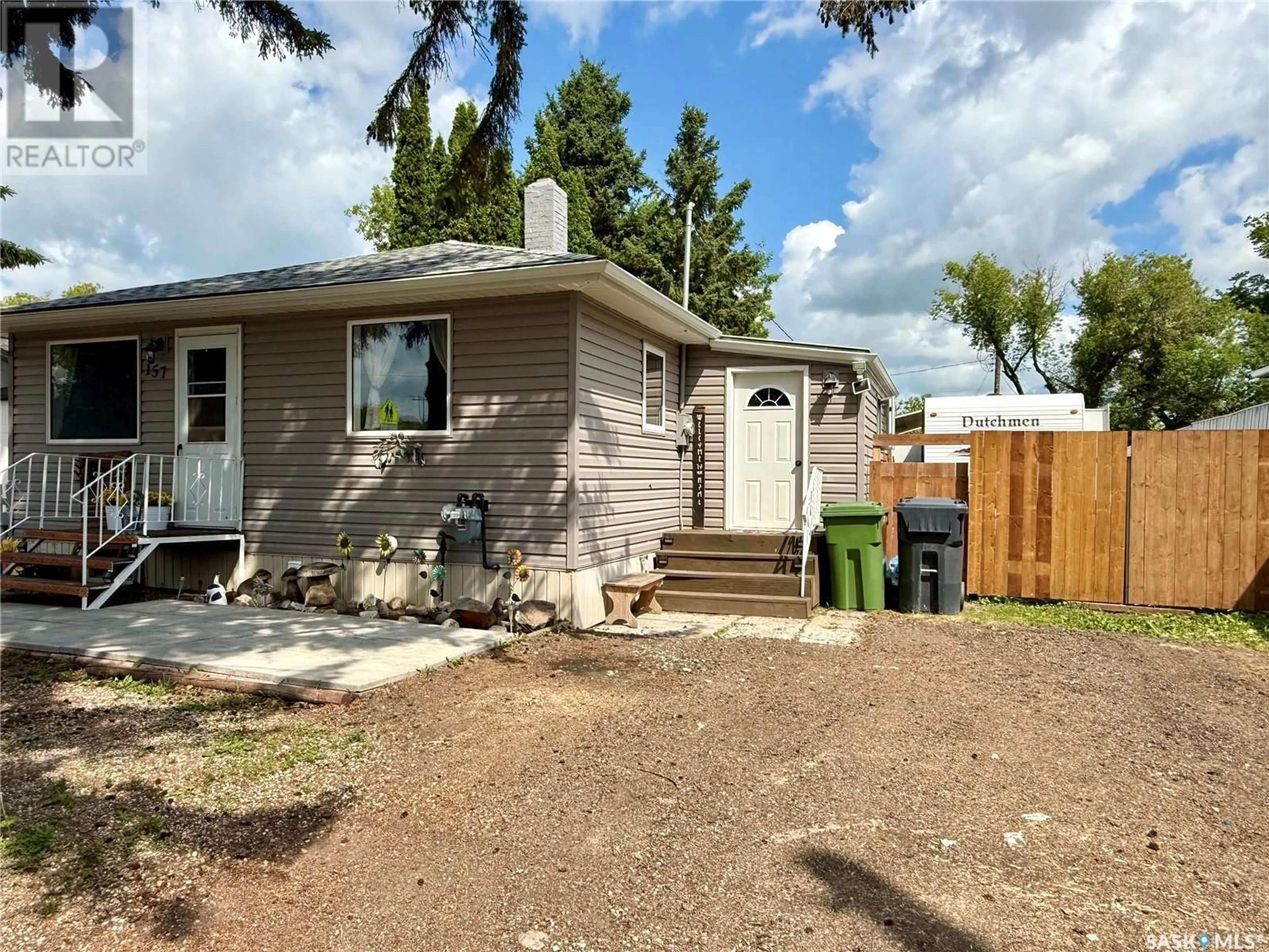 Home with vinyl exterior material, street for 157 DUNLOP STREET, Yorkton Saskatchewan S3N0B7