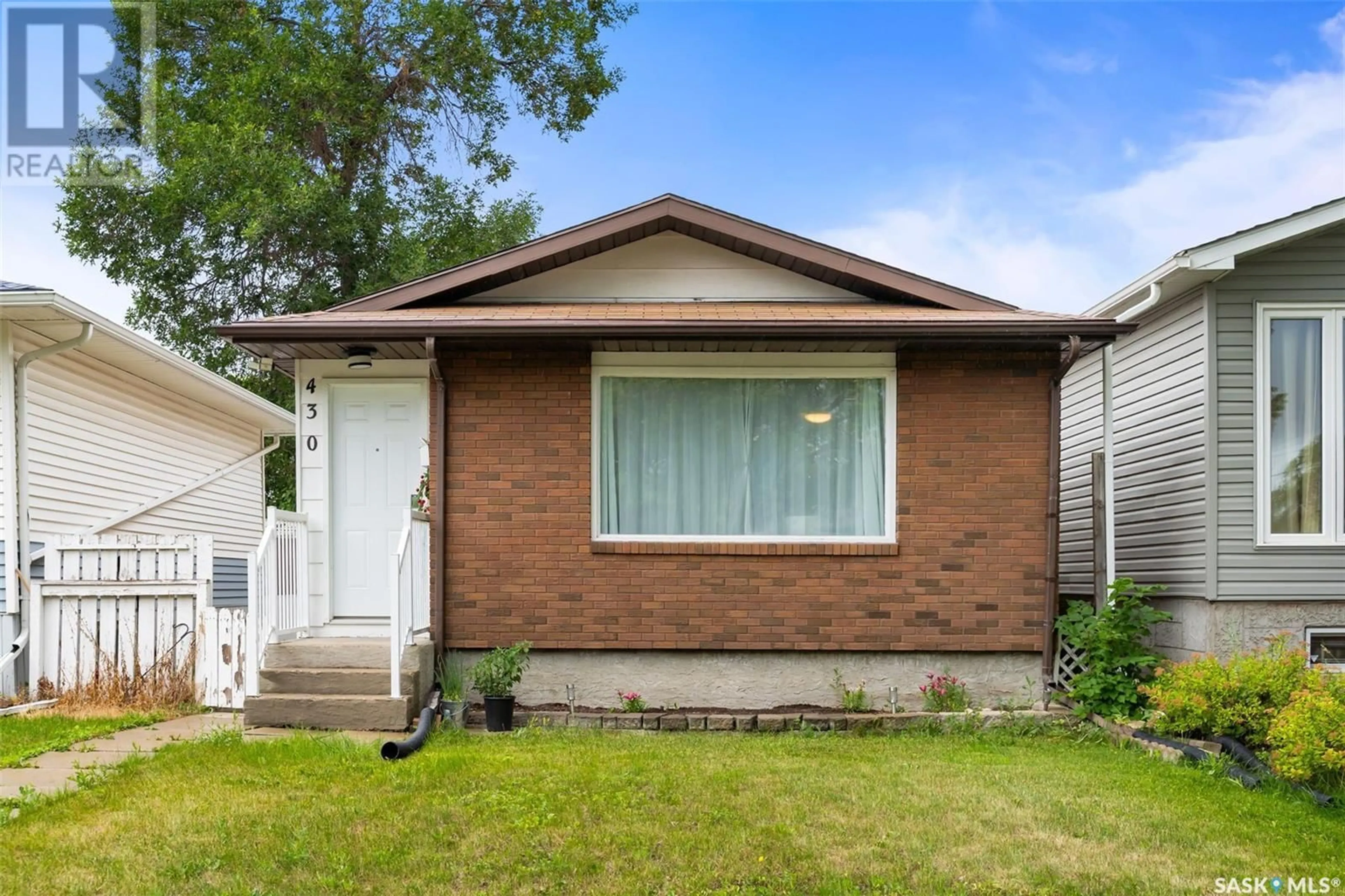 Home with brick exterior material, street for 430 ST JOHN STREET, Regina Saskatchewan S4R1R3