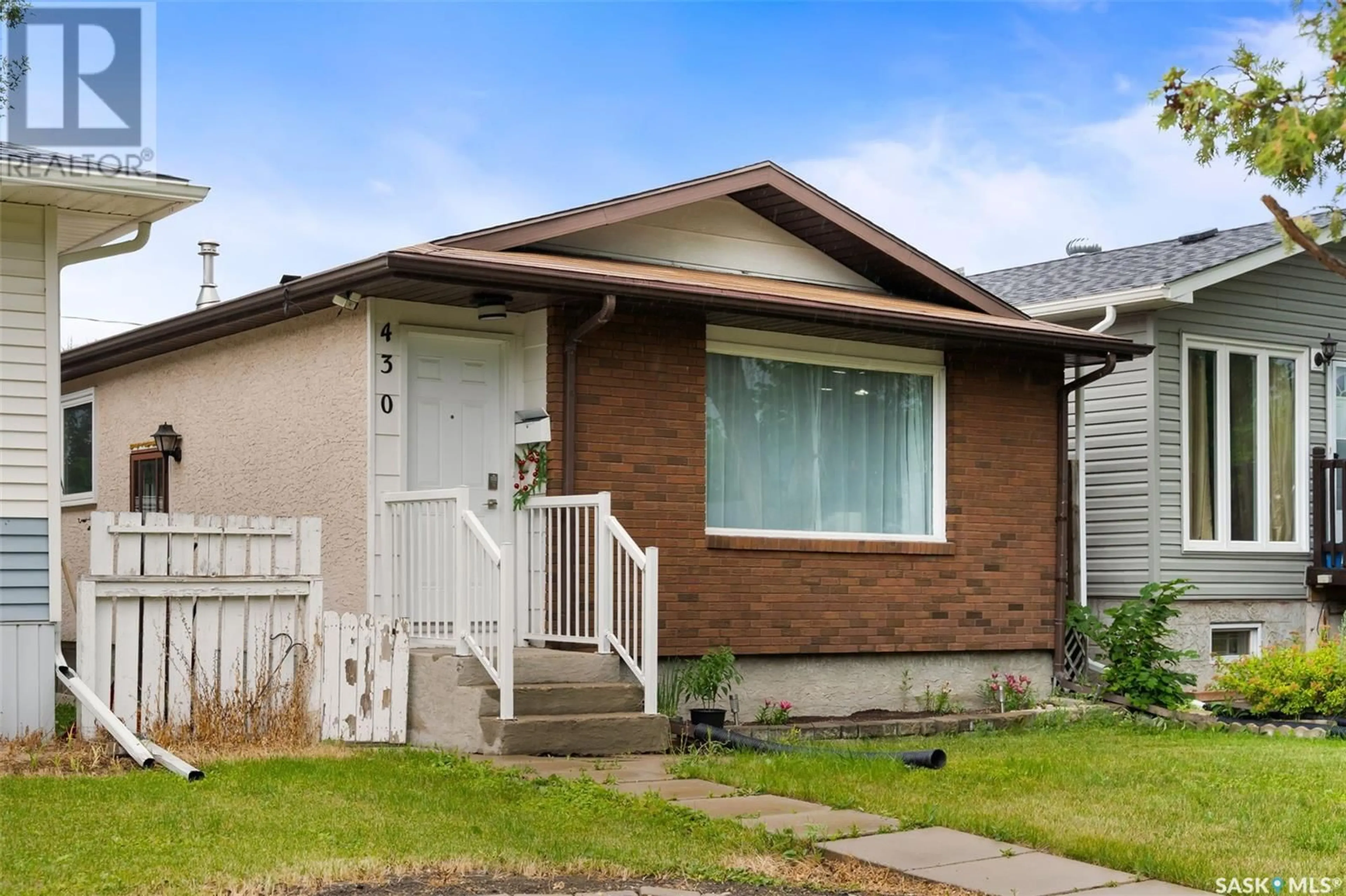 Home with brick exterior material, street for 430 ST JOHN STREET, Regina Saskatchewan S4R1R3