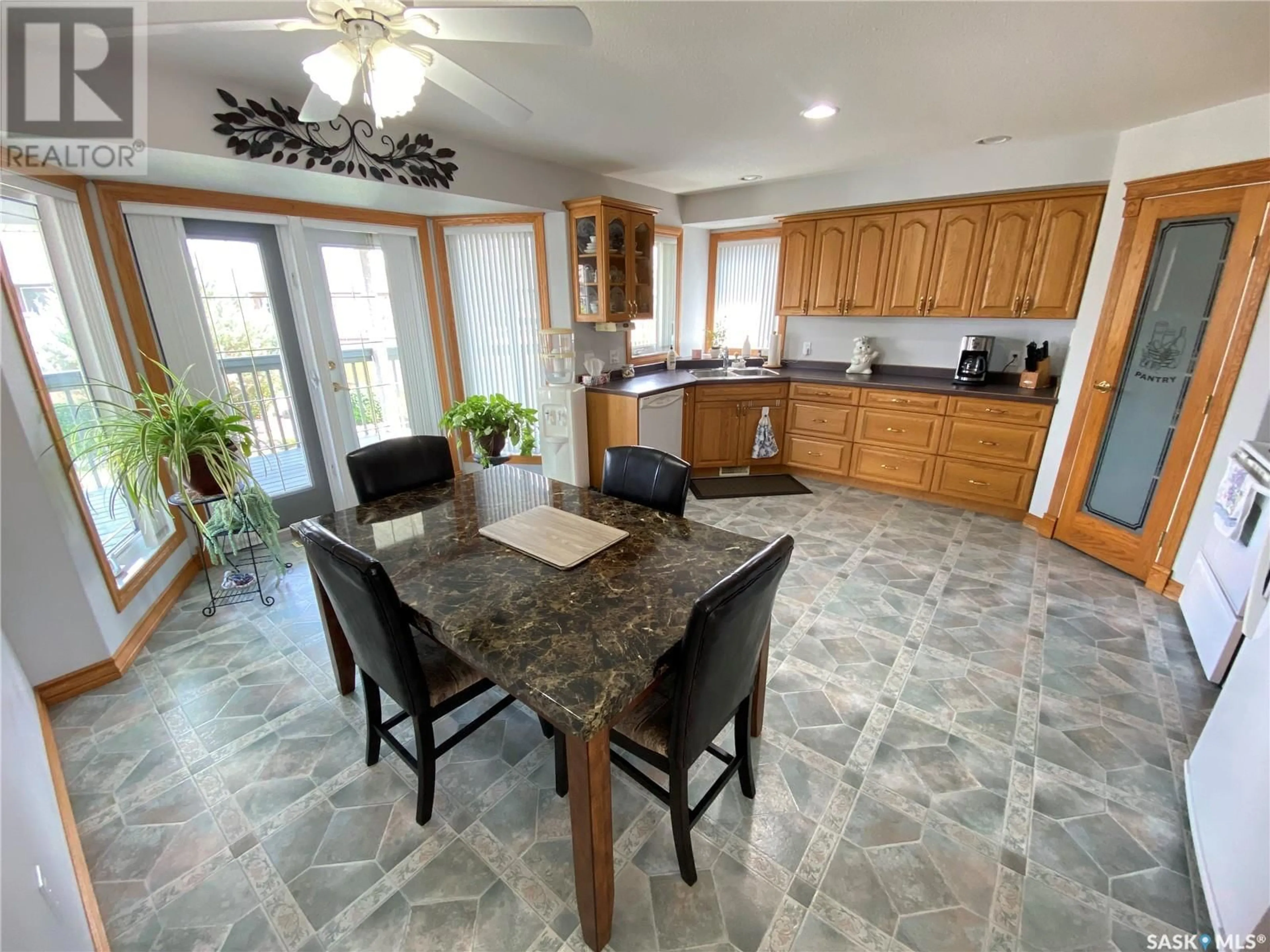 Open concept kitchen, ceramic/tile floor for 28 WYNN PLACE, Yorkton Saskatchewan S3N4A3