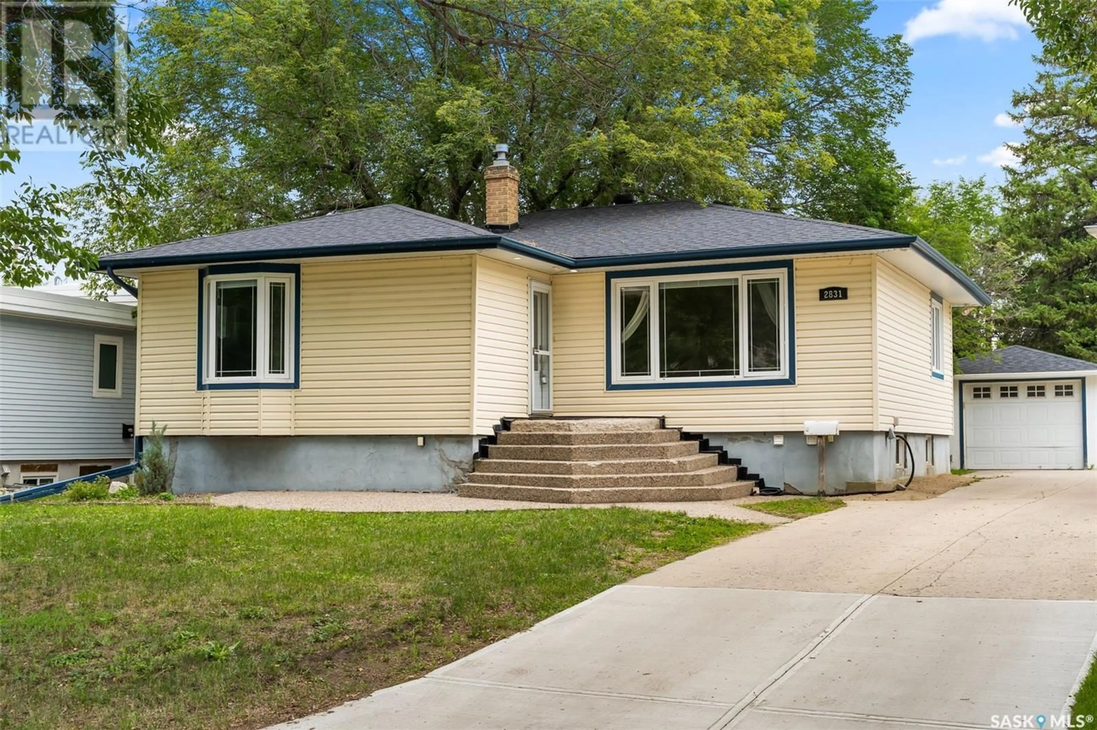 Home with vinyl exterior material, street for 2831 QUINN DRIVE, Regina Saskatchewan S4P2W2