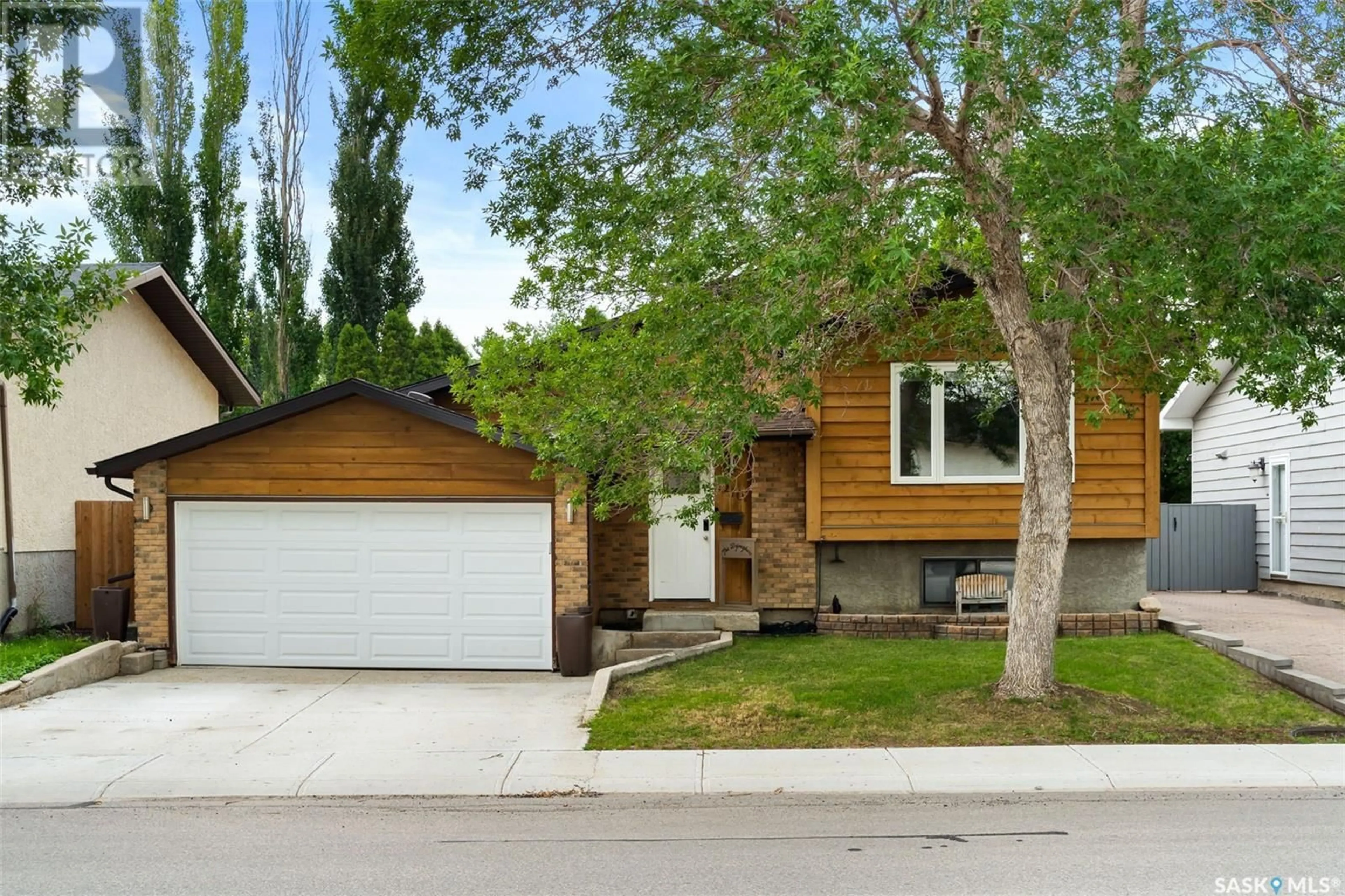 Home with vinyl exterior material, street for 1210 ARNASON STREET, Regina Saskatchewan S4X3W3