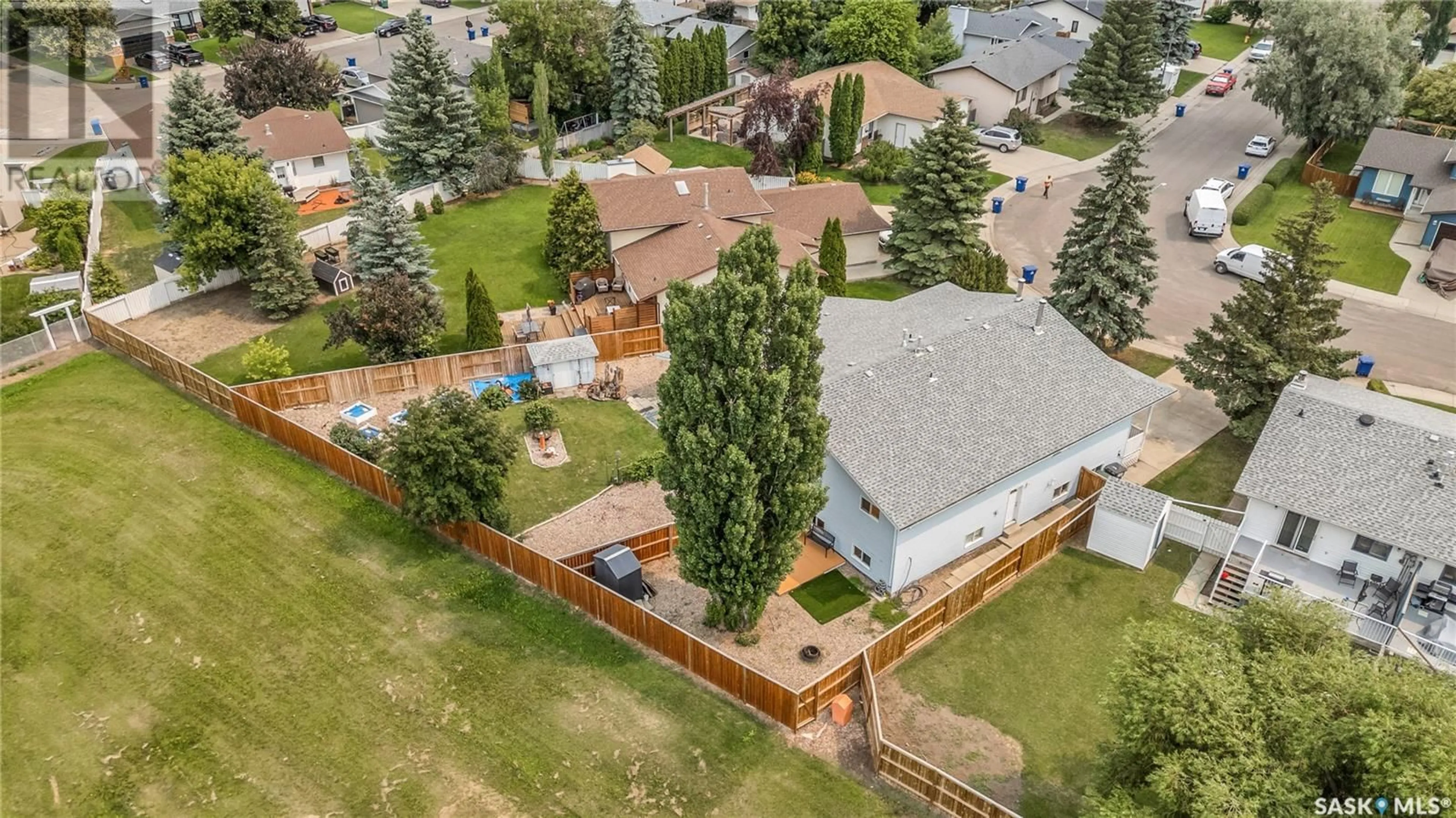 A pic from outside/outdoor area/front of a property/back of a property/a pic from drone, street for 406 & 408 GILLAM CRESCENT, Saskatoon Saskatchewan S7N3R6