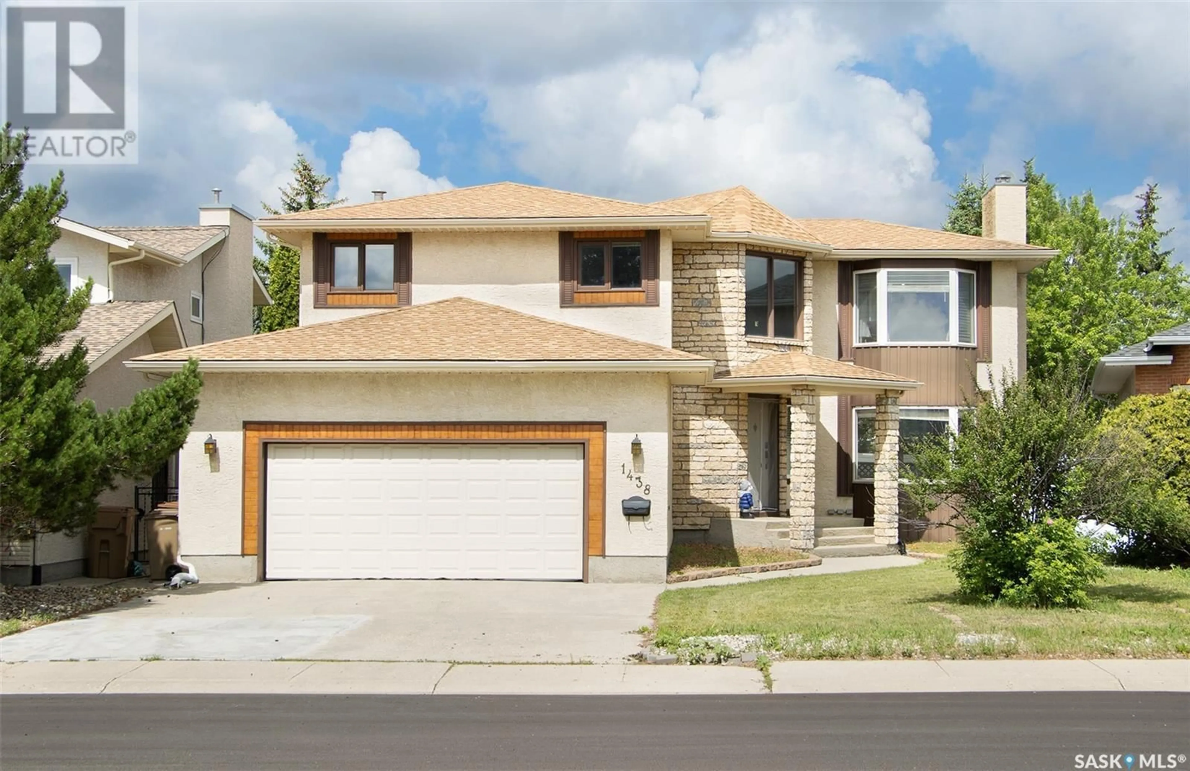 Home with vinyl exterior material, street for 1438 WASCANA HIGHLANDS, Regina Saskatchewan S4V2K5
