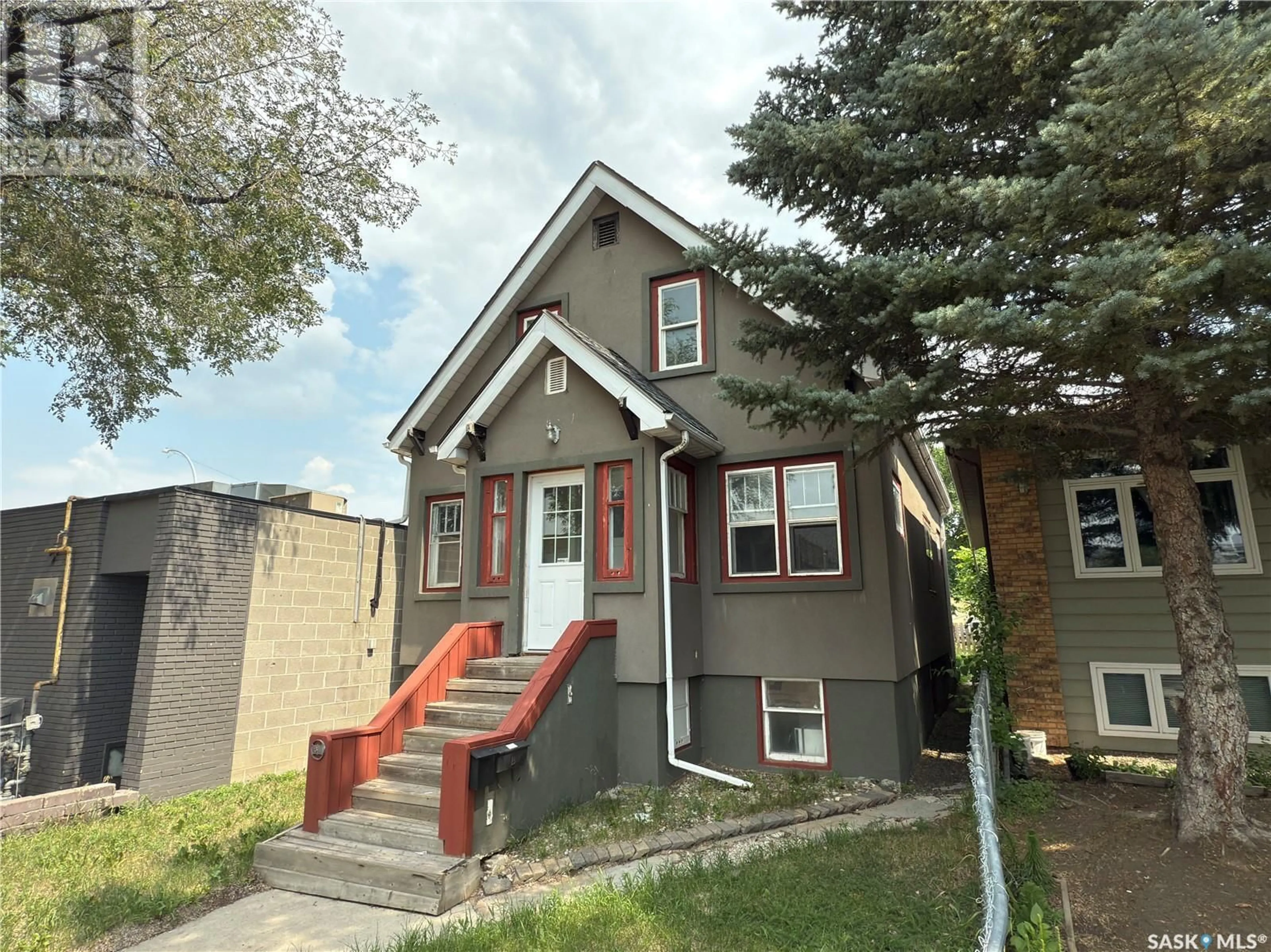 Home with brick exterior material, street for 1811 ST JOHN STREET, Regina Saskatchewan S4P1S1