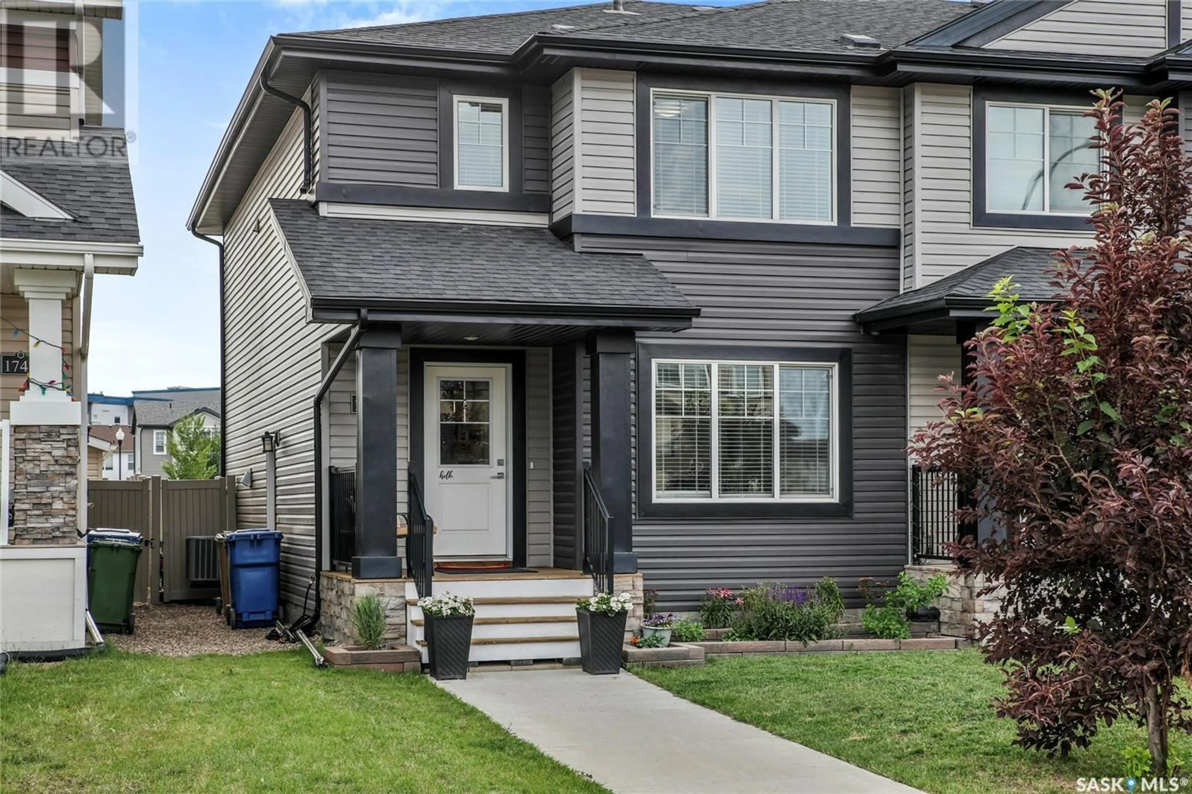 Home with vinyl exterior material, street for 1744 MUSTARD STREET, Regina Saskatchewan S4Y0G1