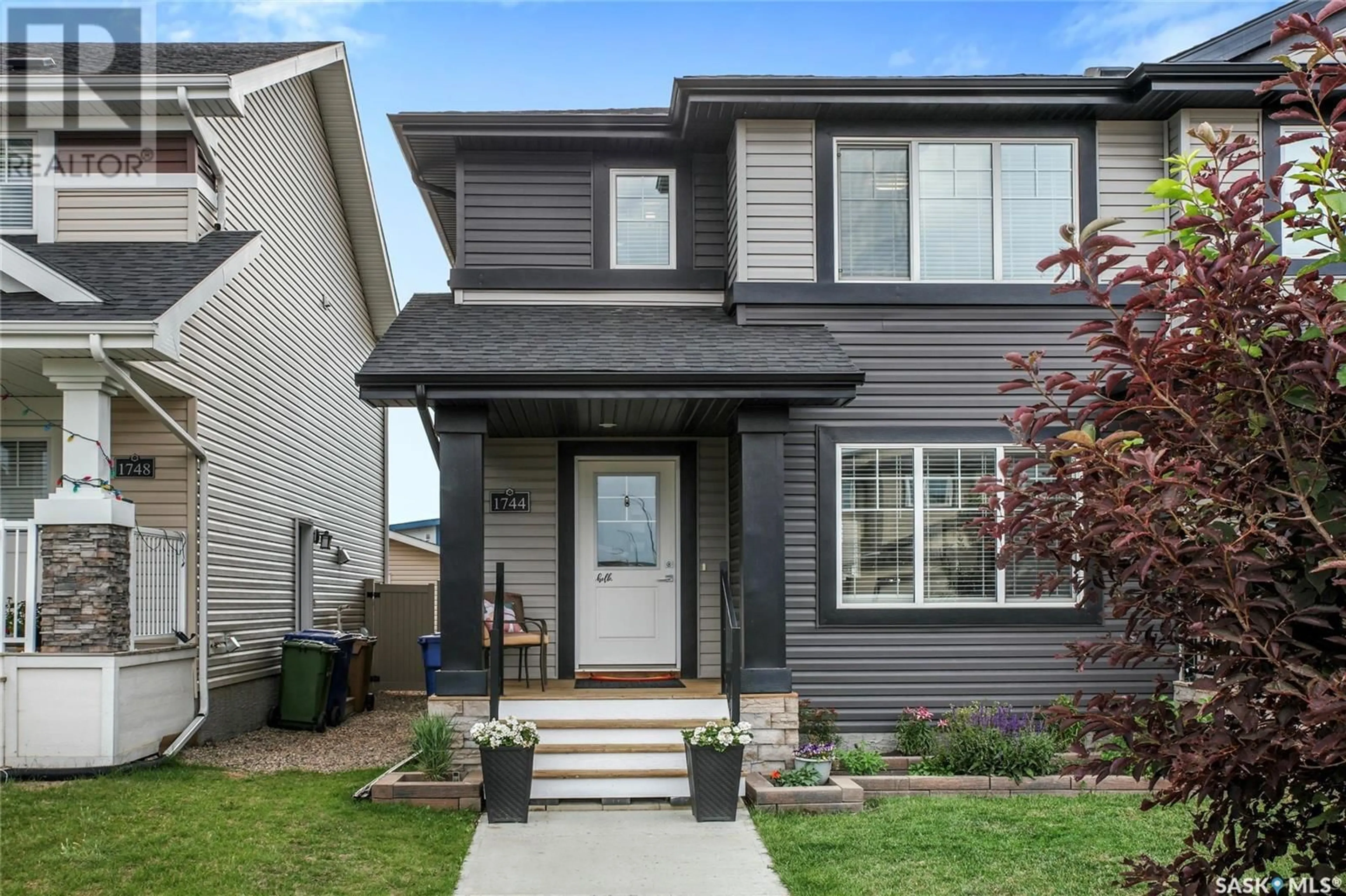 Home with vinyl exterior material, street for 1744 MUSTARD STREET, Regina Saskatchewan S4Y0G1