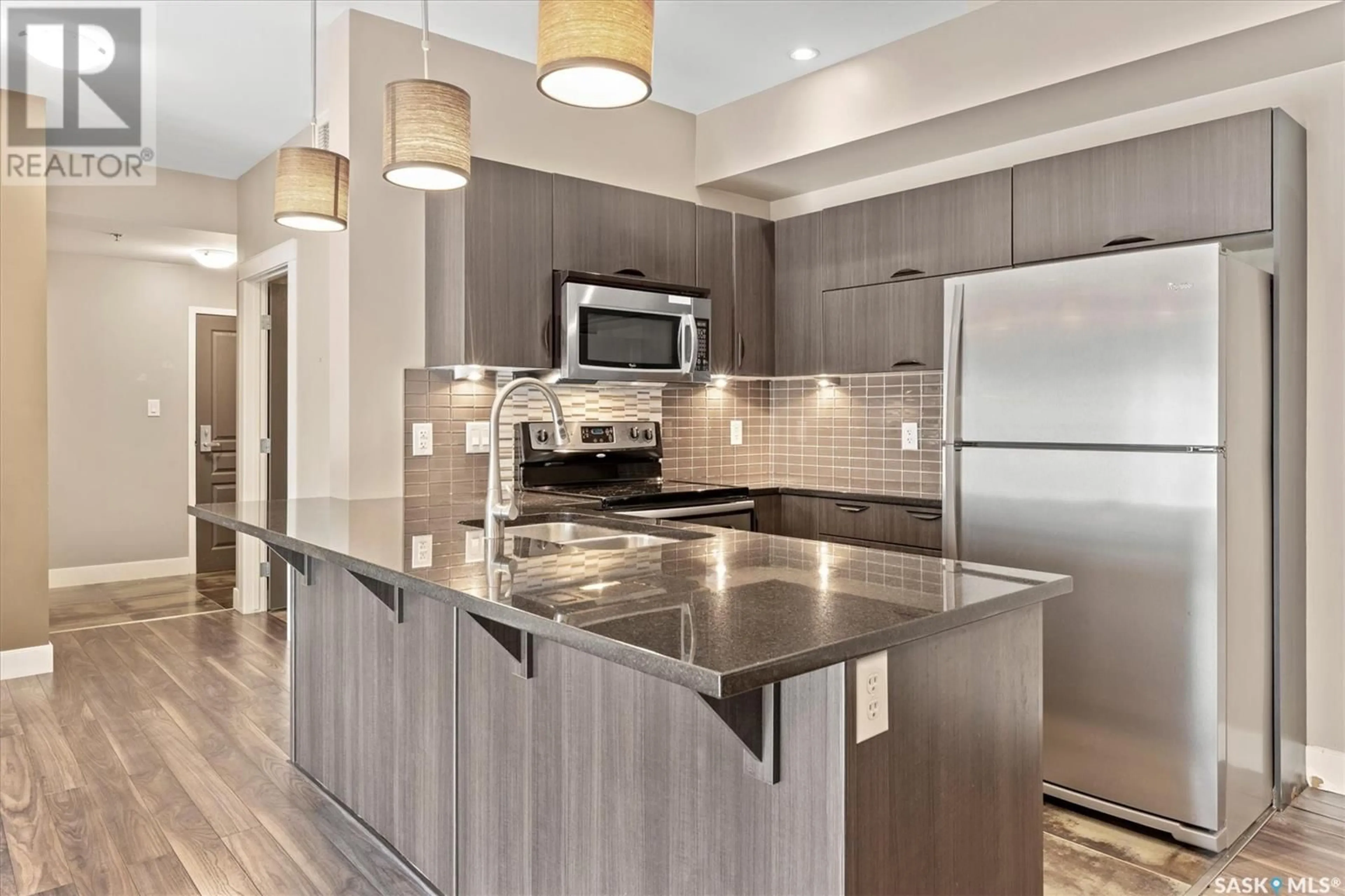 Open concept kitchen, unknown for 103 - 721 8TH STREET, Saskatoon Saskatchewan S7H0R4