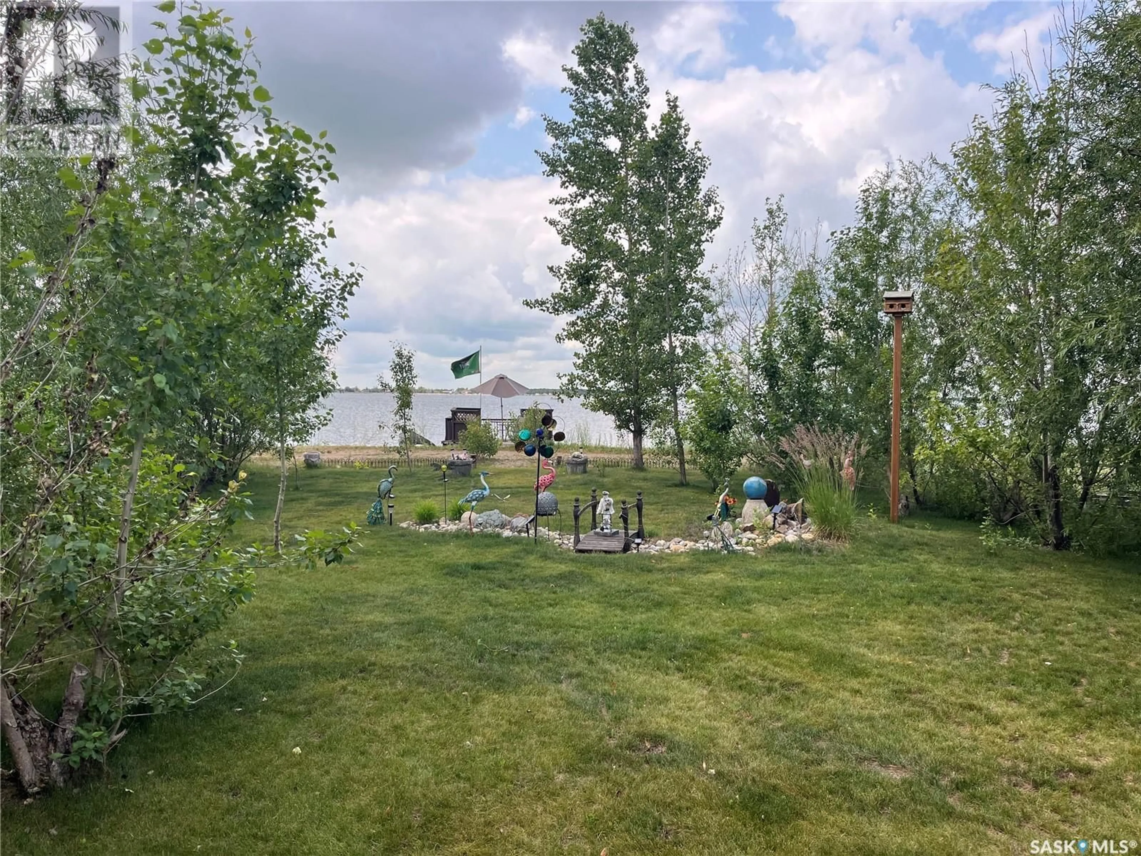 A pic from outside/outdoor area/front of a property/back of a property/a pic from drone, water/lake/river/ocean view for 104 HEISTAD PLACE, Fishing Lake Saskatchewan S0A1Y0
