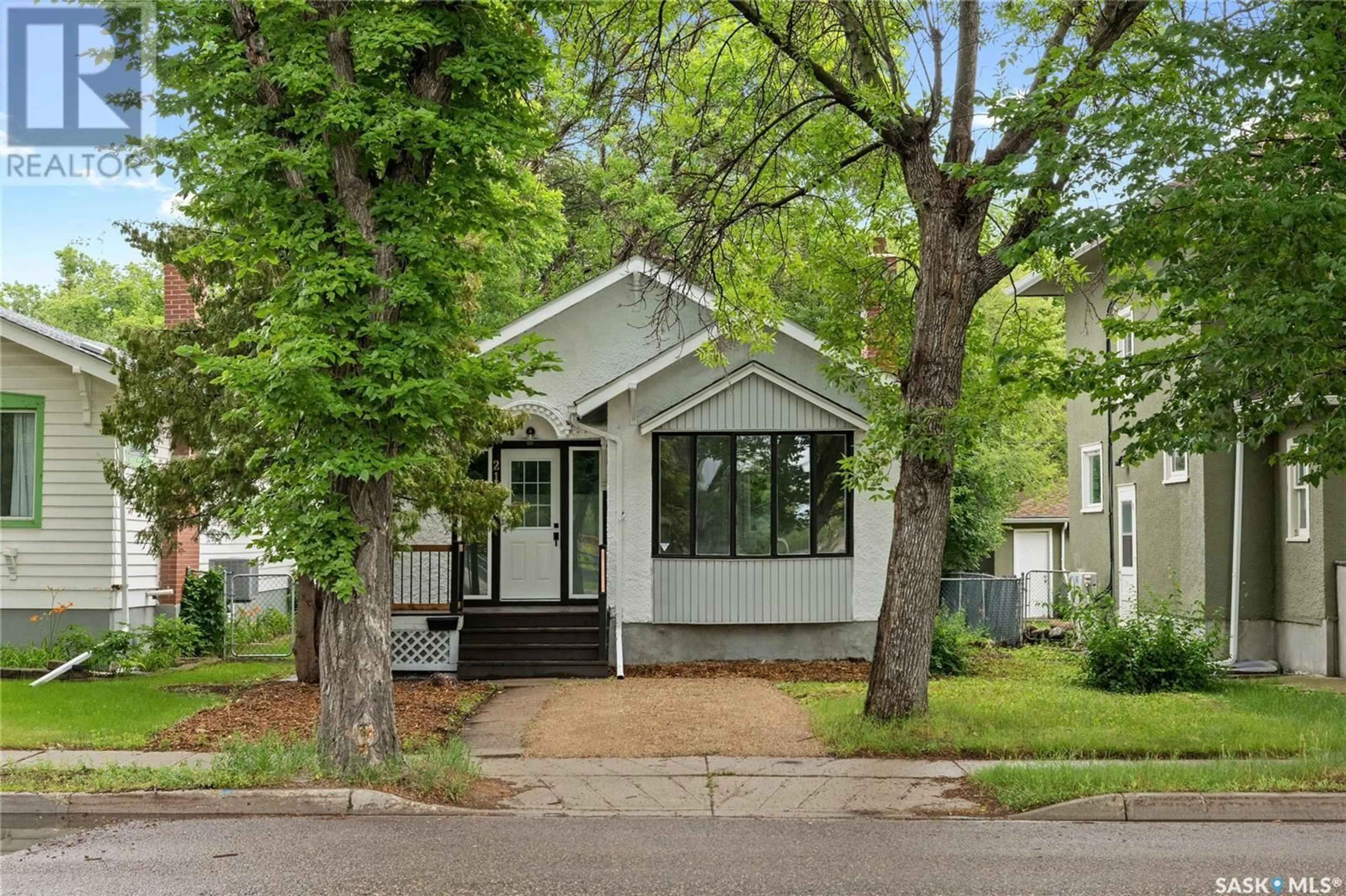 Home with vinyl exterior material, street for 2149 ELPHINSTONE STREET, Regina Saskatchewan S4T3N7