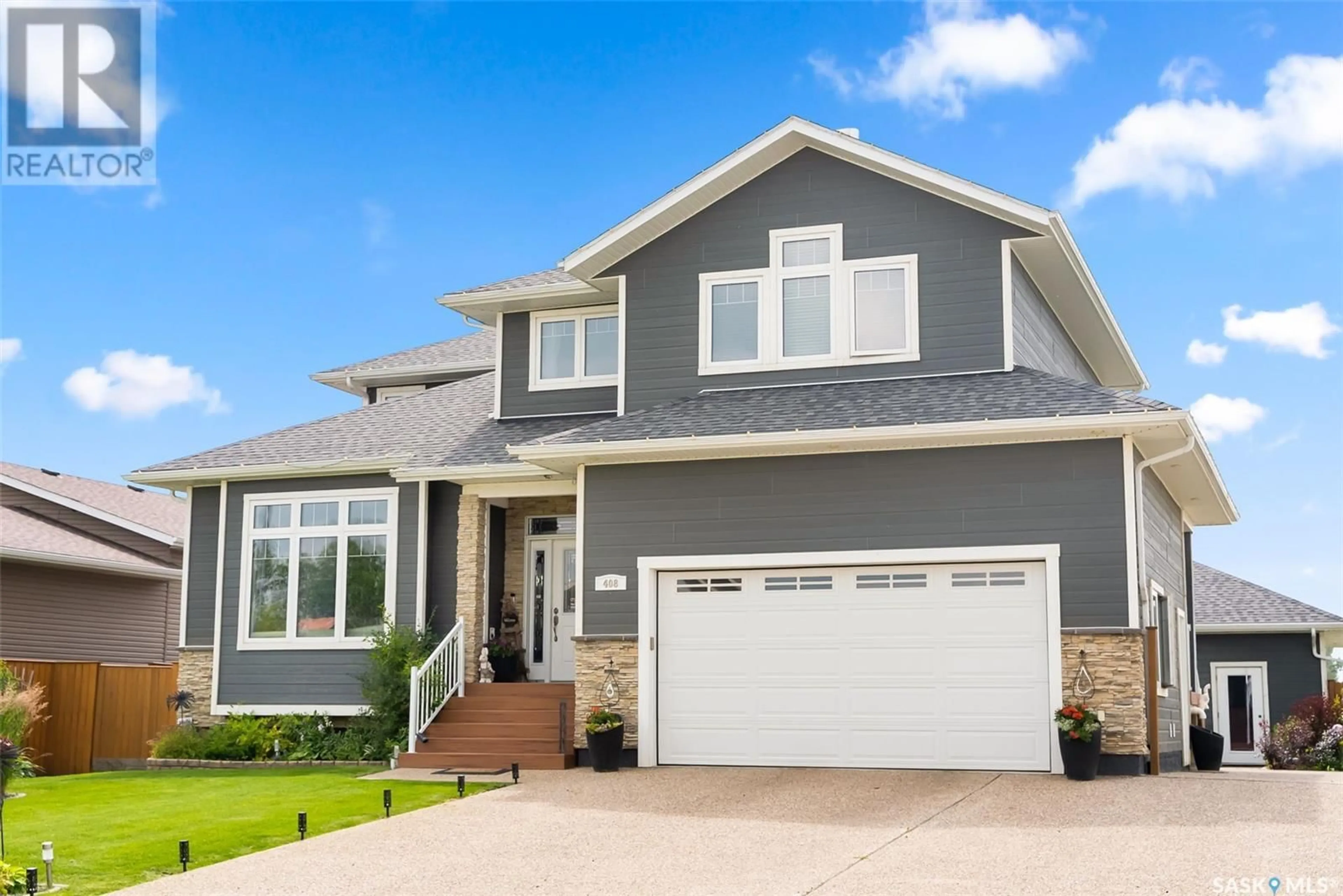 Home with vinyl exterior material, street for 408 BEATTY STREET, Indian Head Saskatchewan S0G2K0