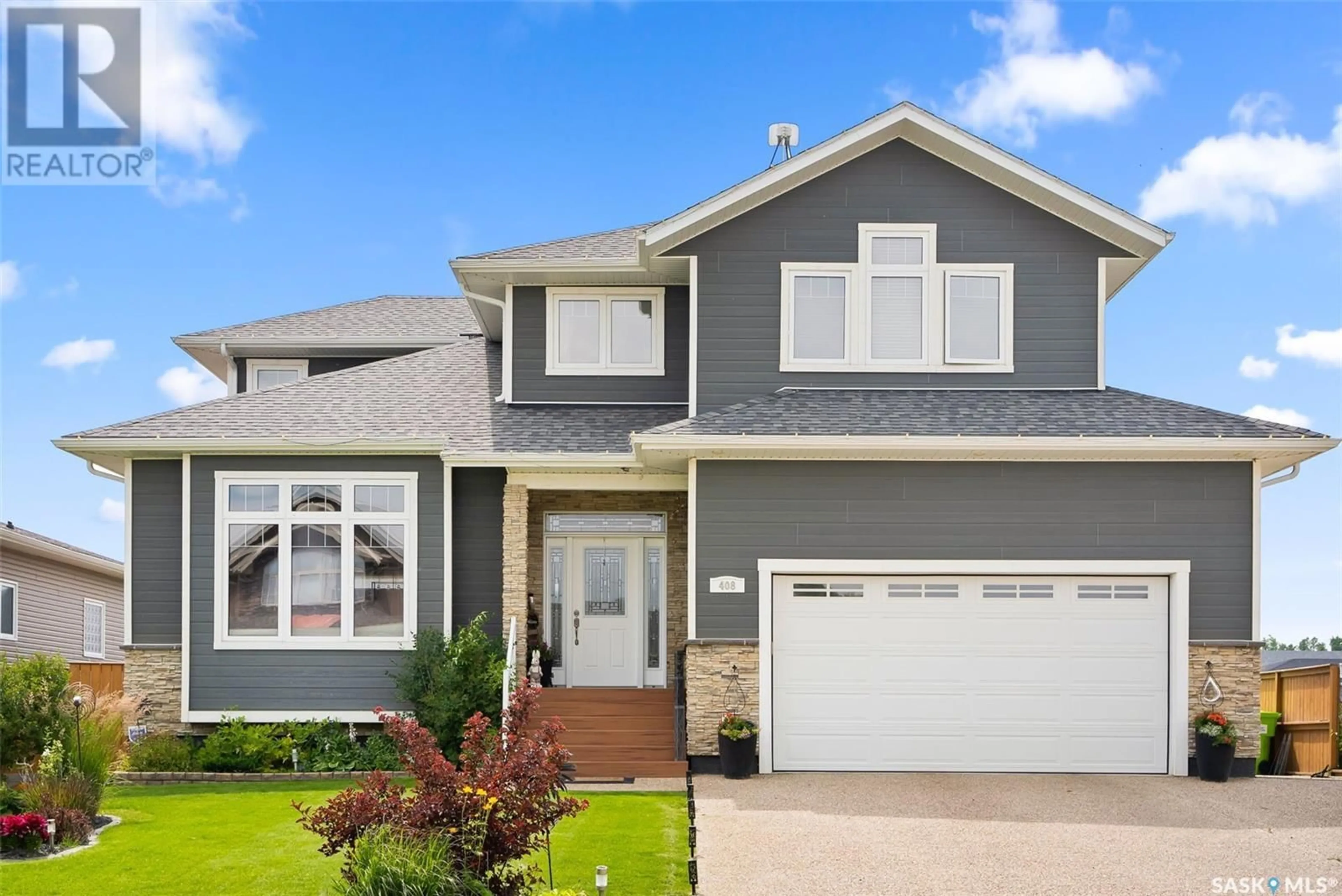 Home with vinyl exterior material, street for 408 BEATTY STREET, Indian Head Saskatchewan S0G2K0