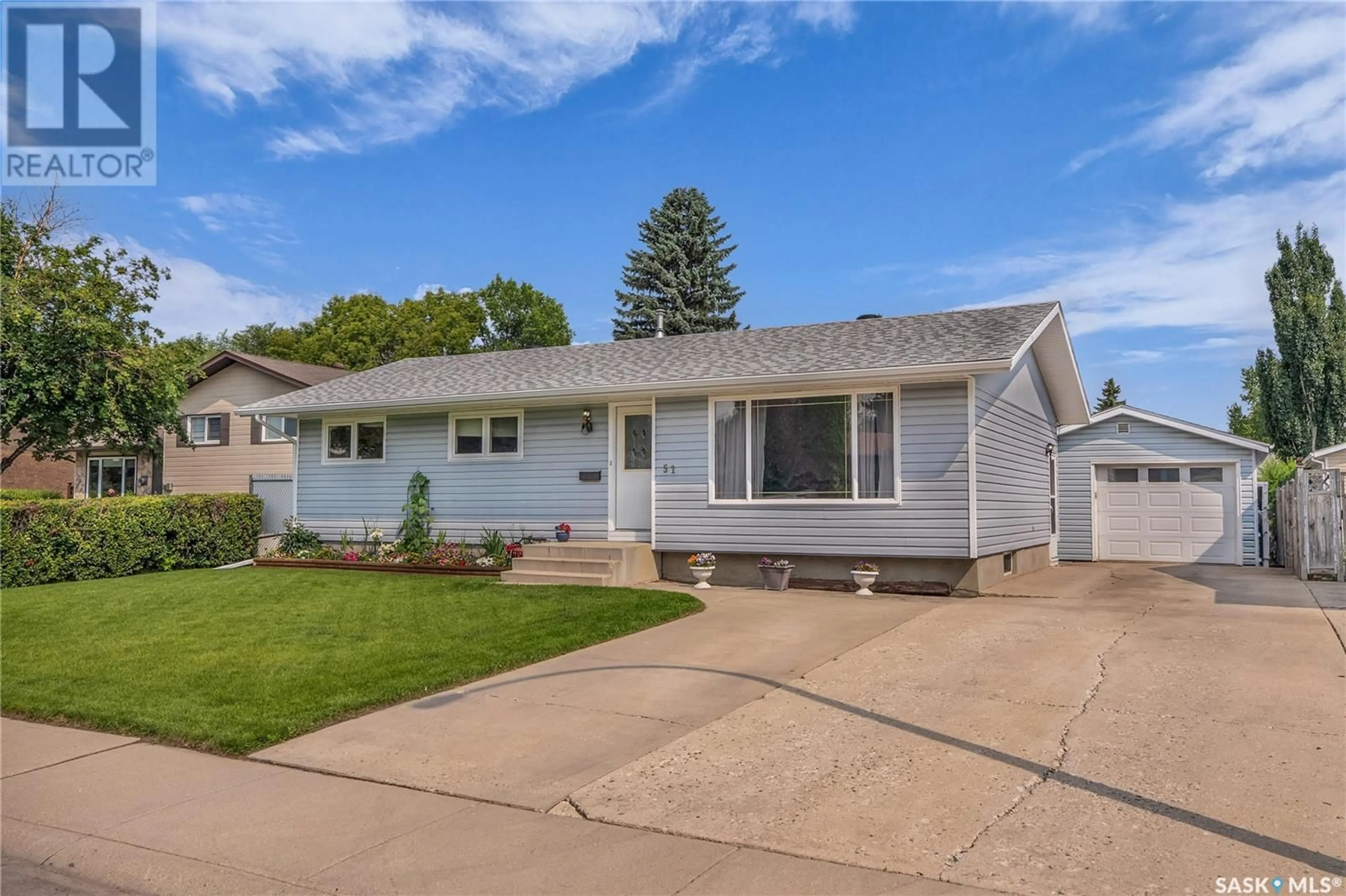 Home with vinyl exterior material, street for 51 JORDAN PLACE, Saskatoon Saskatchewan S7L4J2