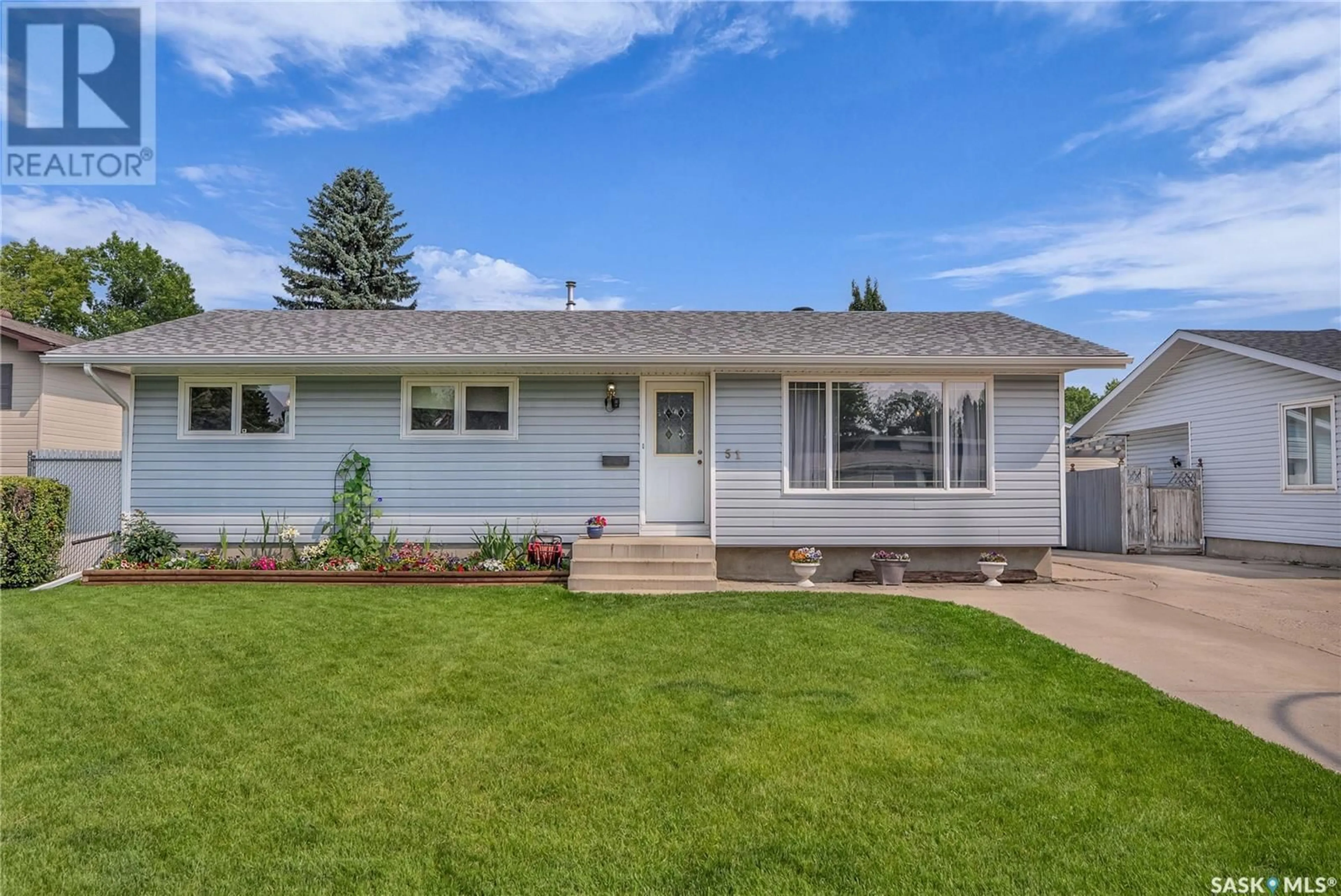 Home with vinyl exterior material, street for 51 JORDAN PLACE, Saskatoon Saskatchewan S7L4J2