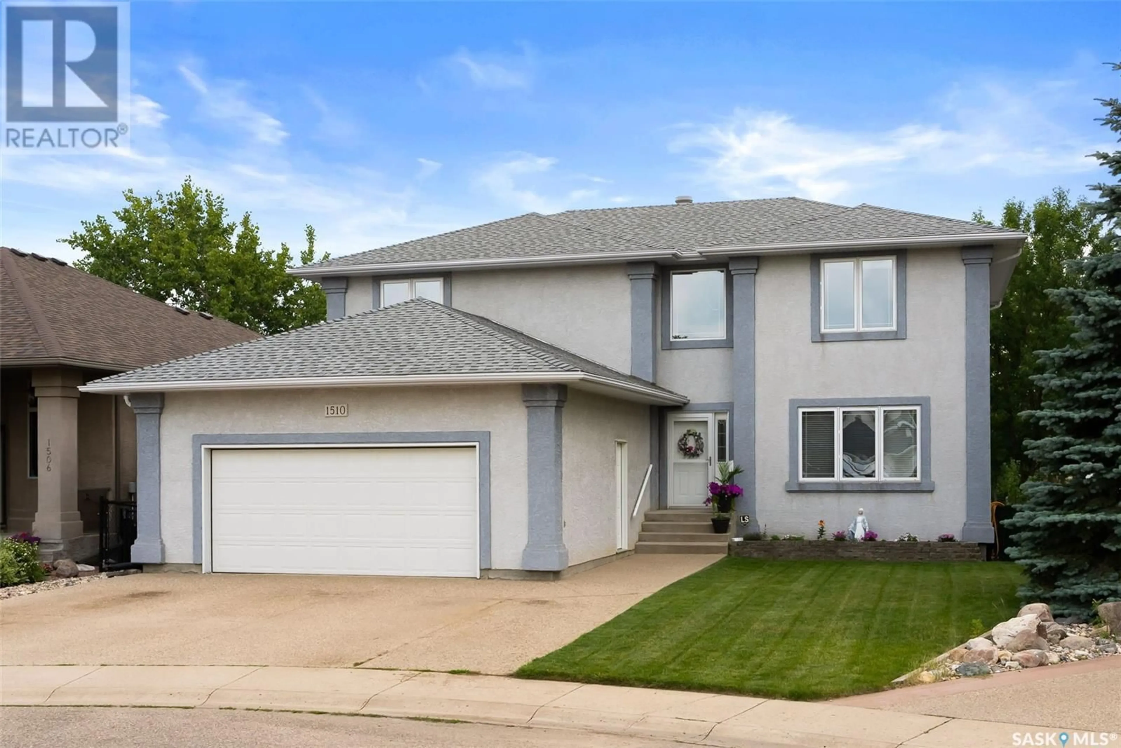 Home with vinyl exterior material, street for 1510 LAKERIDGE DRIVE, Regina Saskatchewan S4X4L5