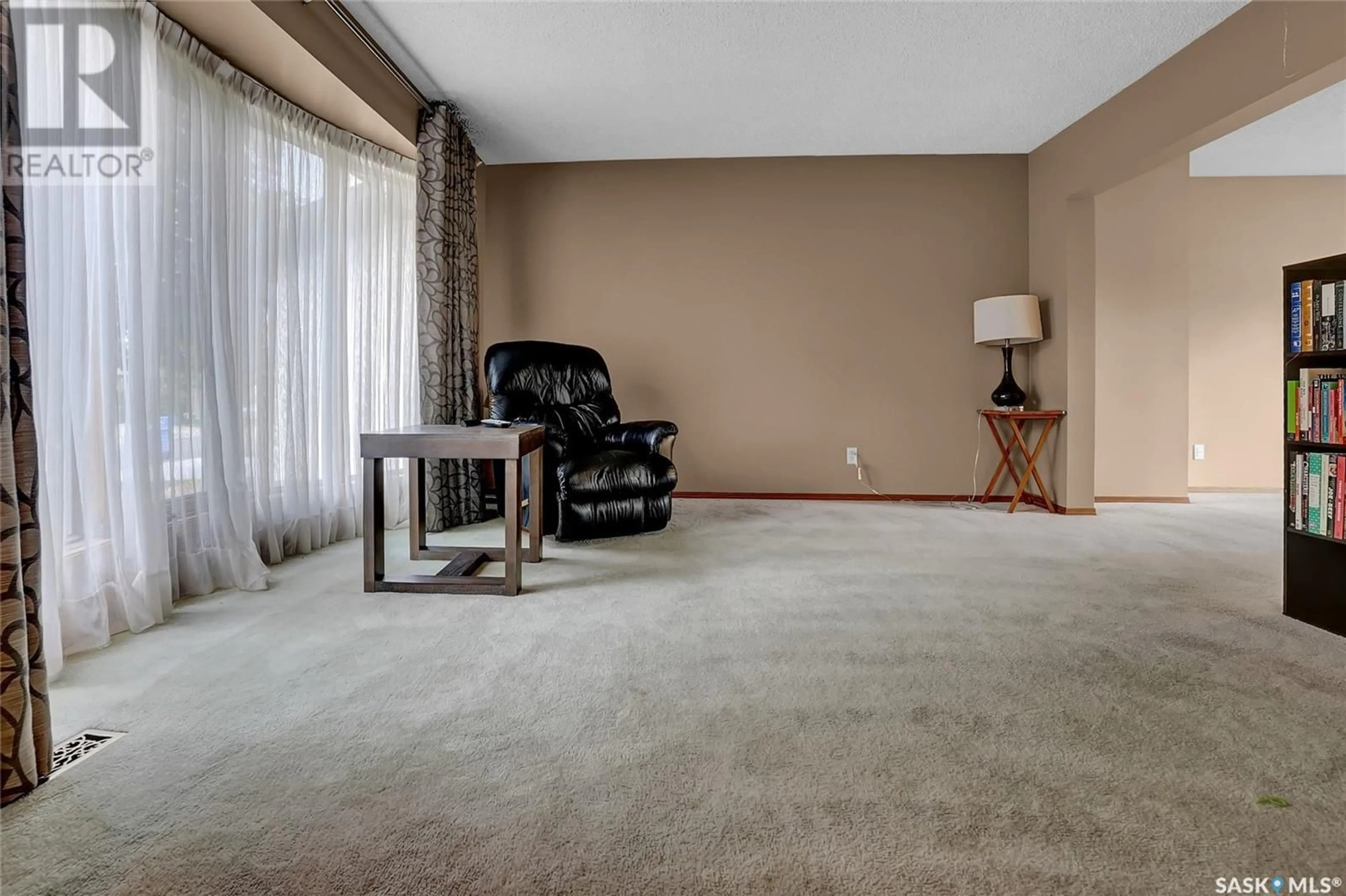 Living room with furniture, carpet floor for E - 2226 HANOVER CRESCENT, Regina Saskatchewan S4V0Z6