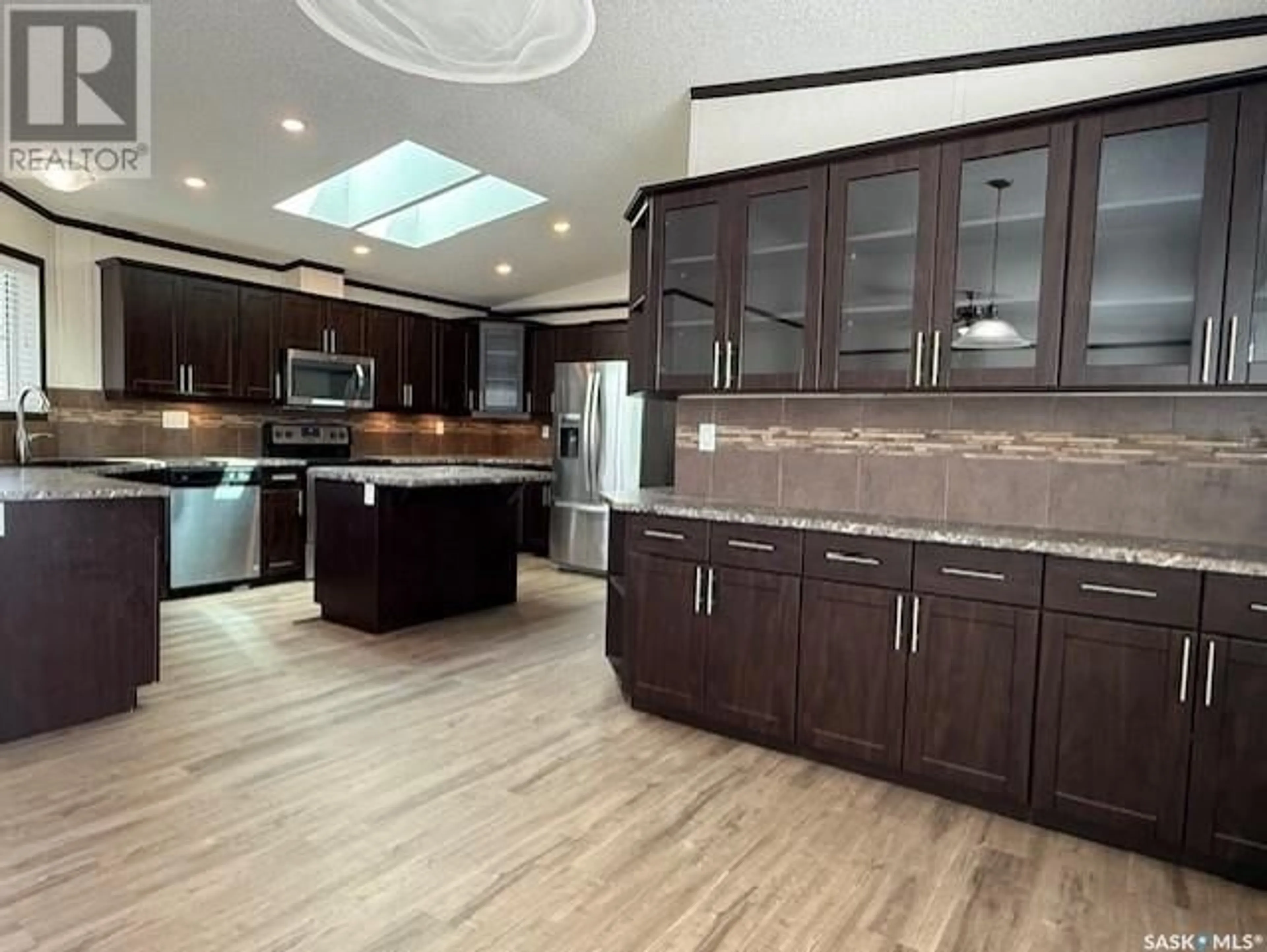 Open concept kitchen, unknown for 118 MONTREAL STREET, Melville Saskatchewan S0A2P0
