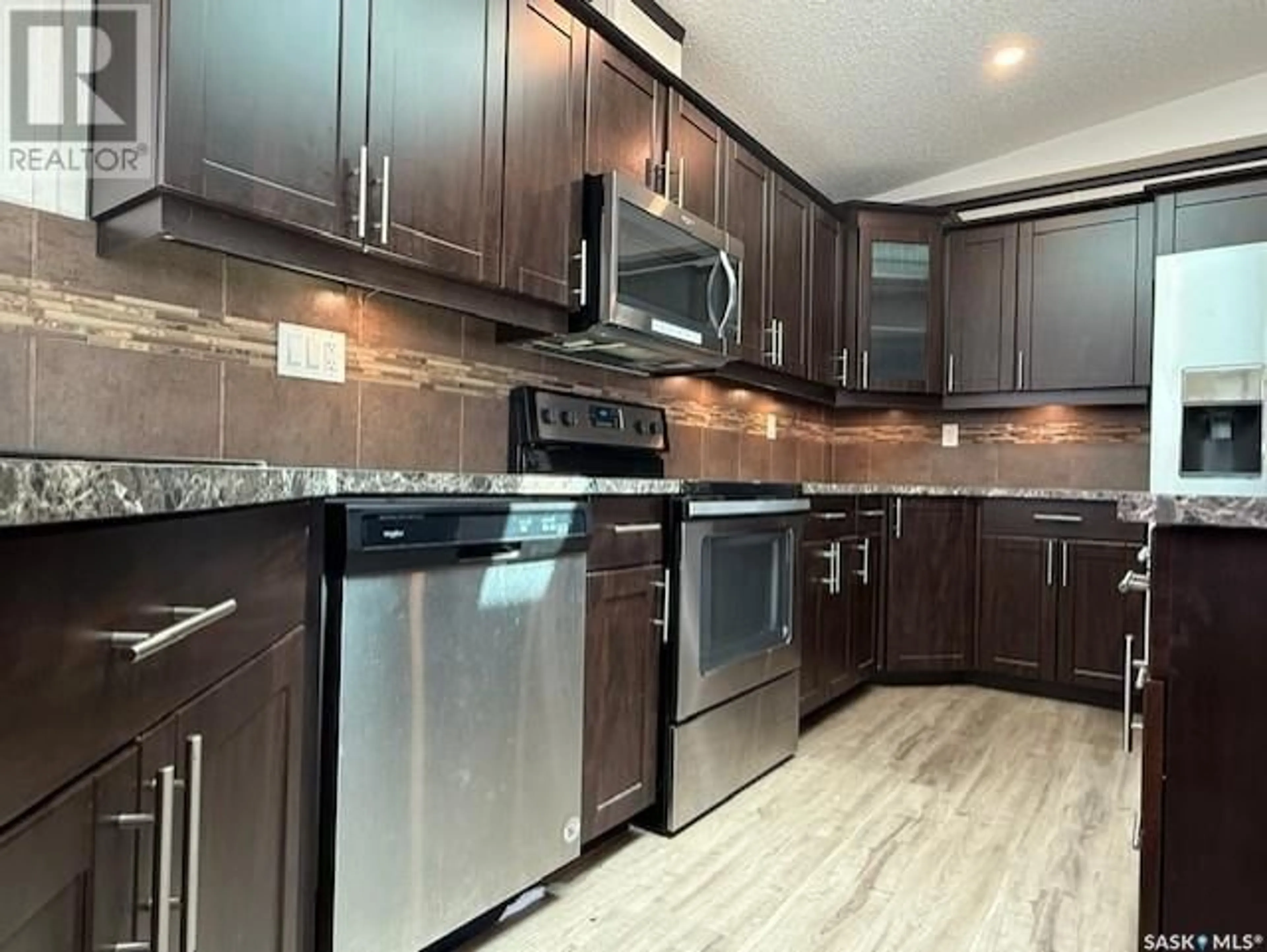 Open concept kitchen, unknown for 118 MONTREAL STREET, Melville Saskatchewan S0A2P0