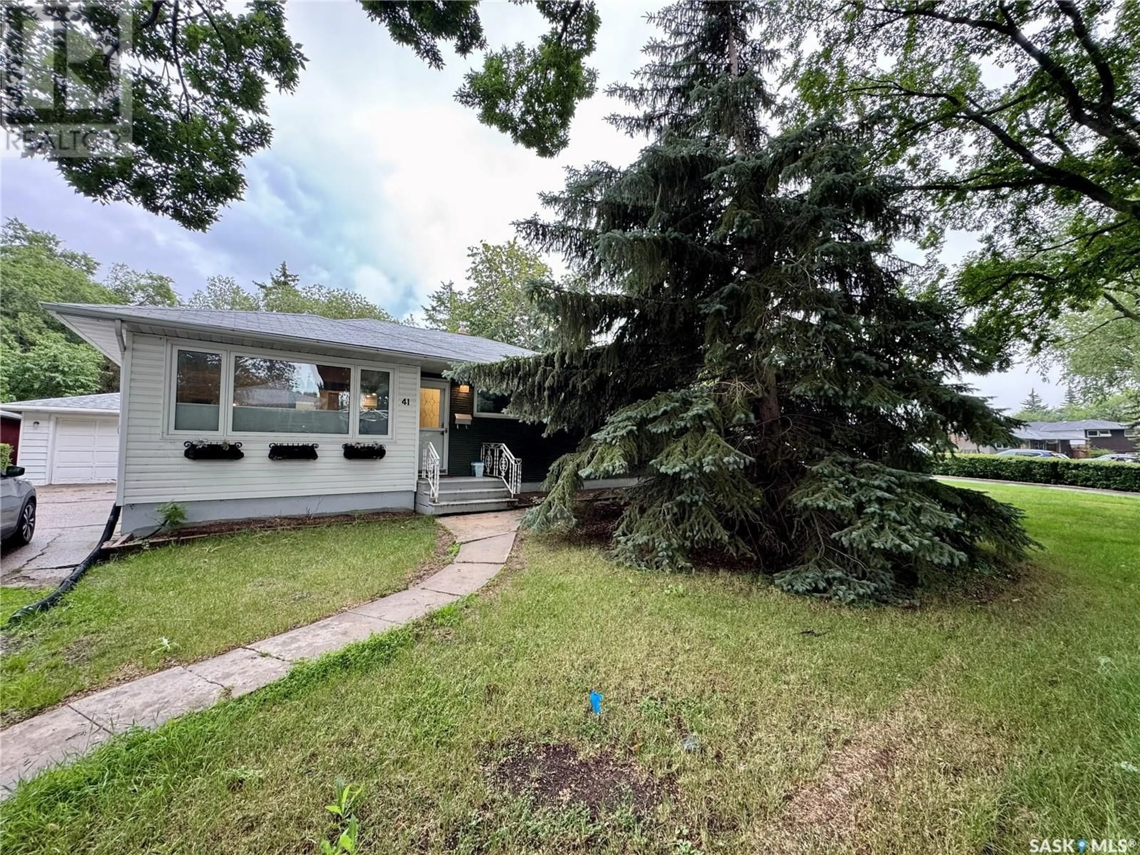 Home with vinyl exterior material, street for 41 MCNAB CRESCENT, Regina Saskatchewan A4S4A9