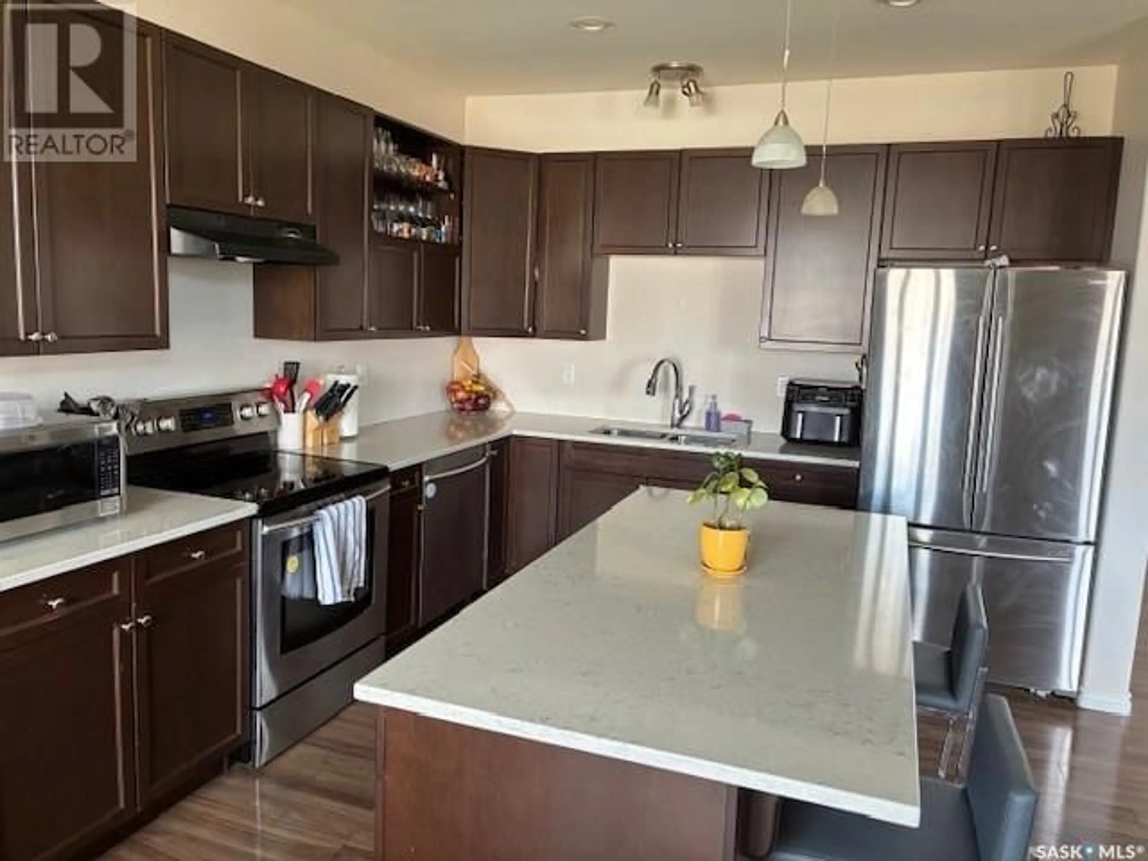 Open concept kitchen, unknown for 411 LANGLOIS WAY, Saskatoon Saskatchewan S7T0M9
