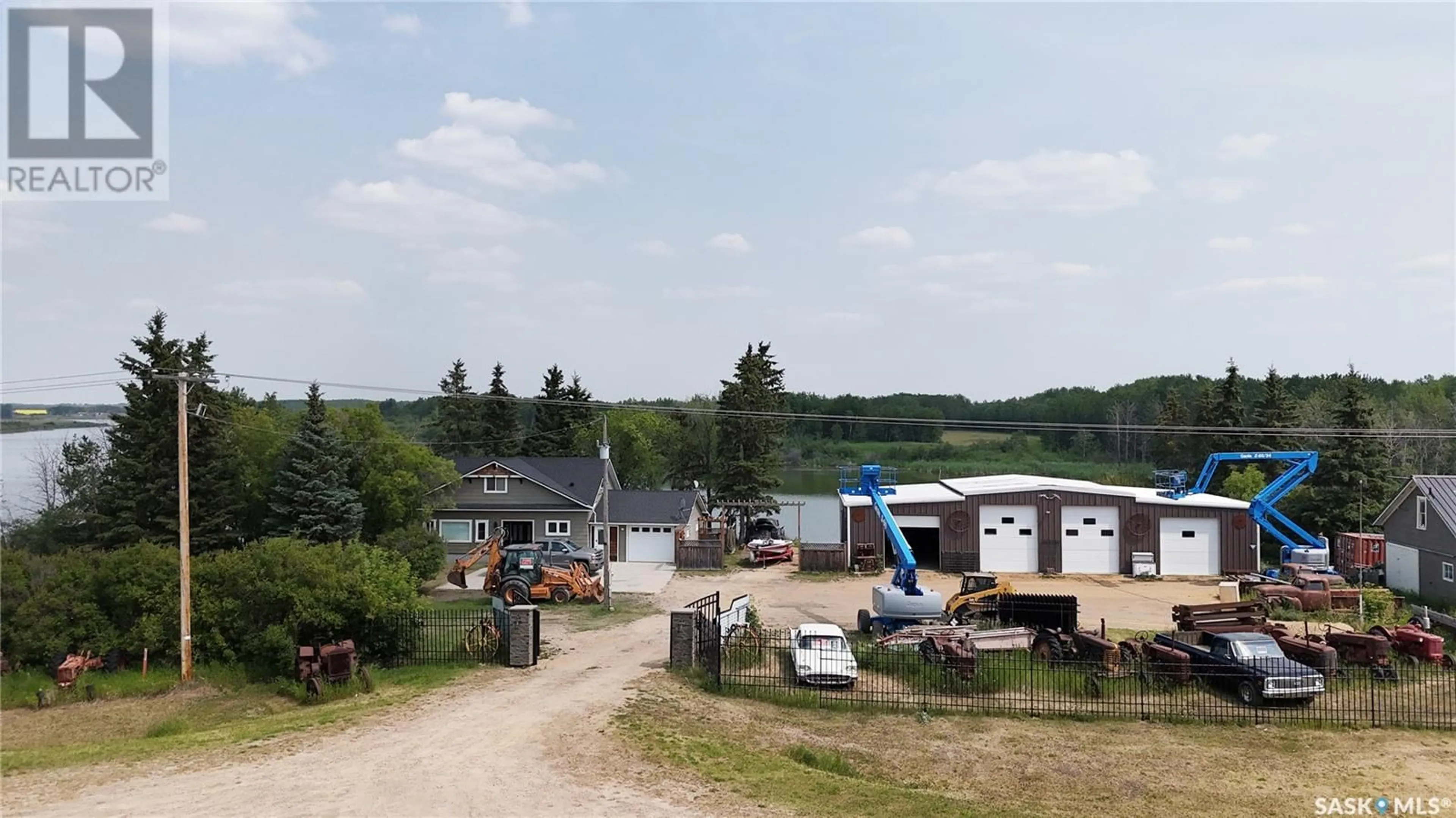 A pic from outside/outdoor area/front of a property/back of a property/a pic from drone, water/lake/river/ocean view for SIBBALD LAKE, Parkdale Rm No. 498 Saskatchewan S0M0Y0