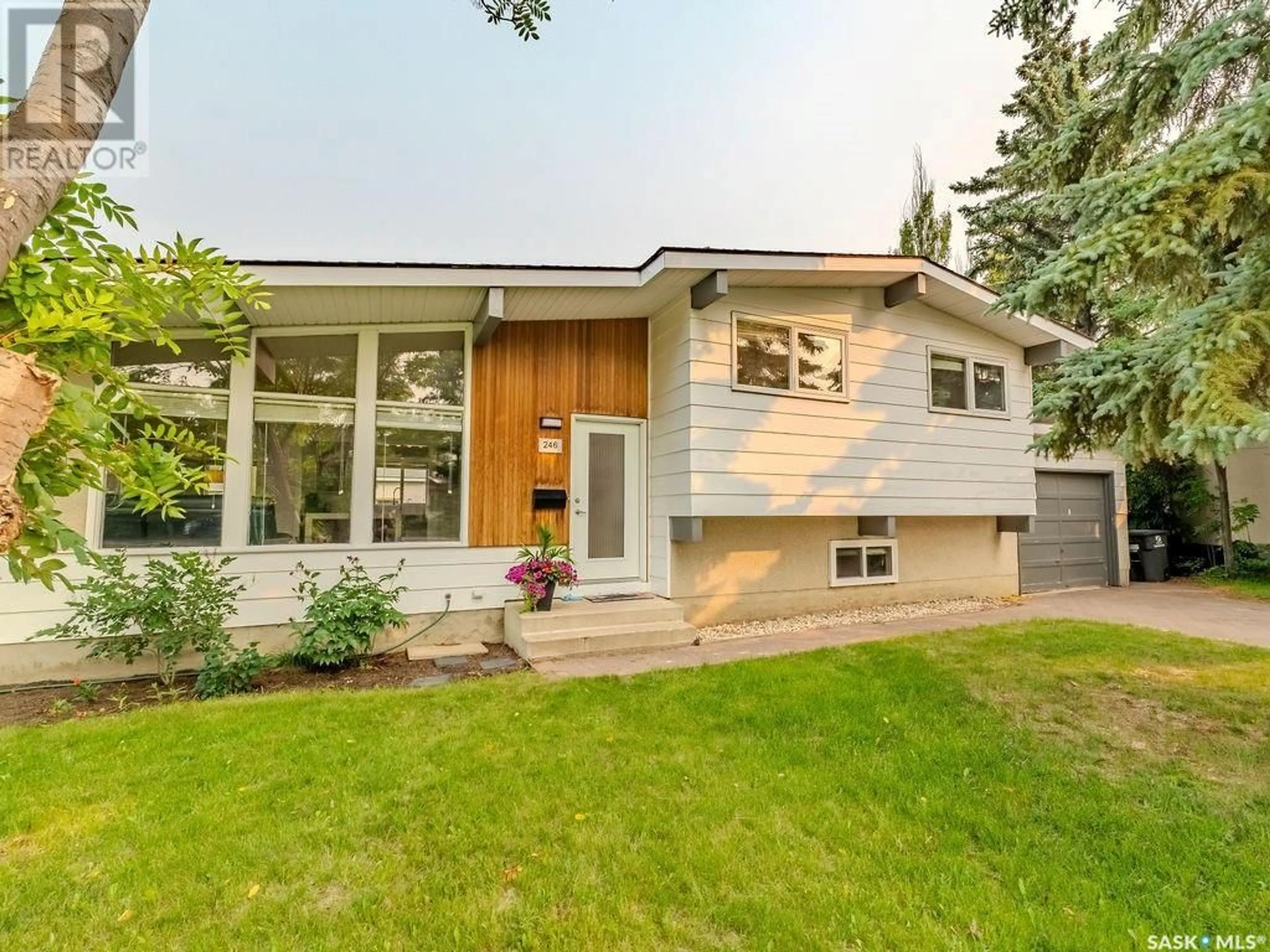 Home with vinyl exterior material, street for 246 ANDERSON CRESCENT, Saskatoon Saskatchewan S7H4C2