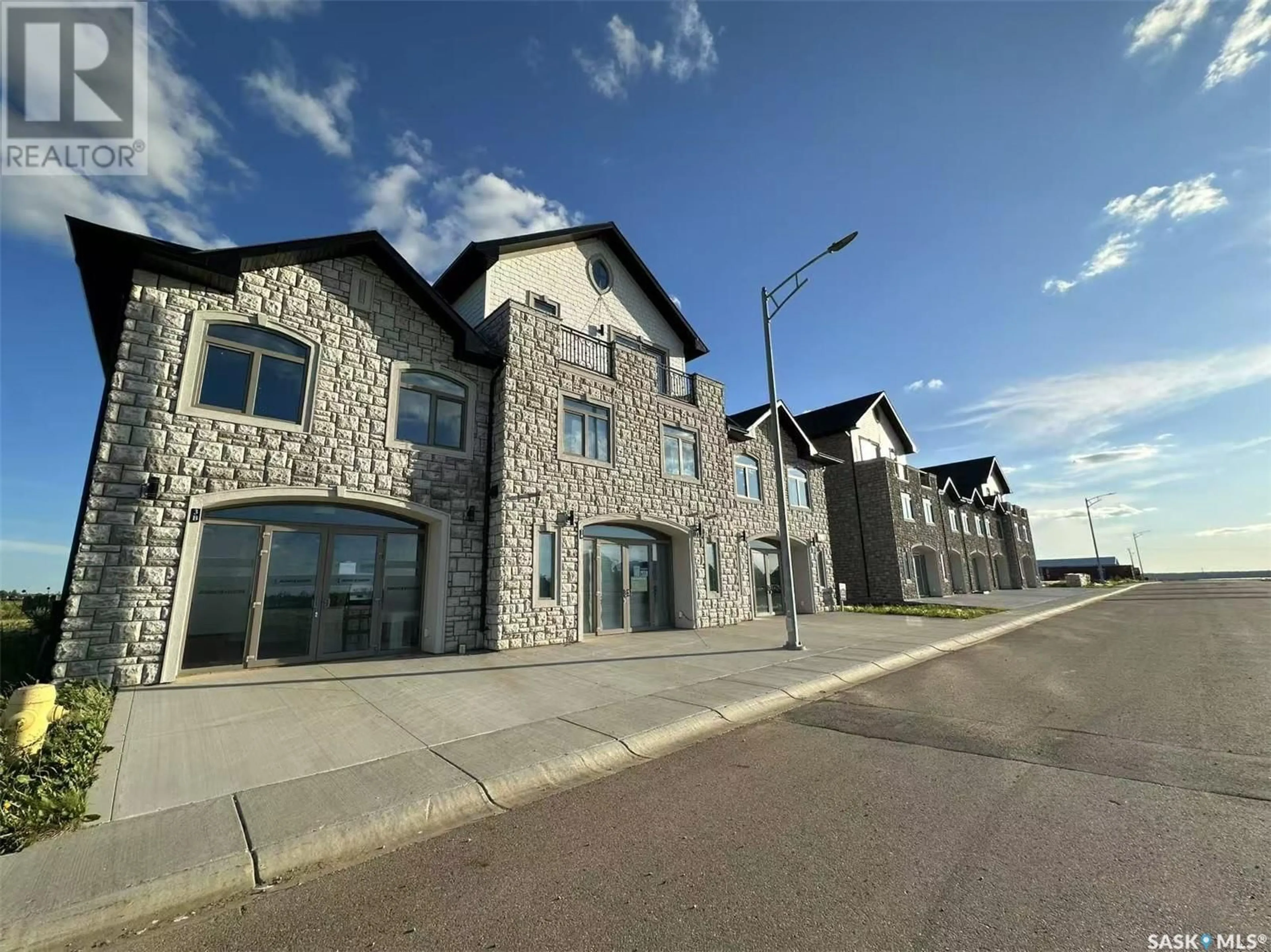 A pic from outside/outdoor area/front of a property/back of a property/a pic from drone, building for 2 298 PRAIRIE DAWN DRIVE, Dundurn Saskatchewan S0K1K0