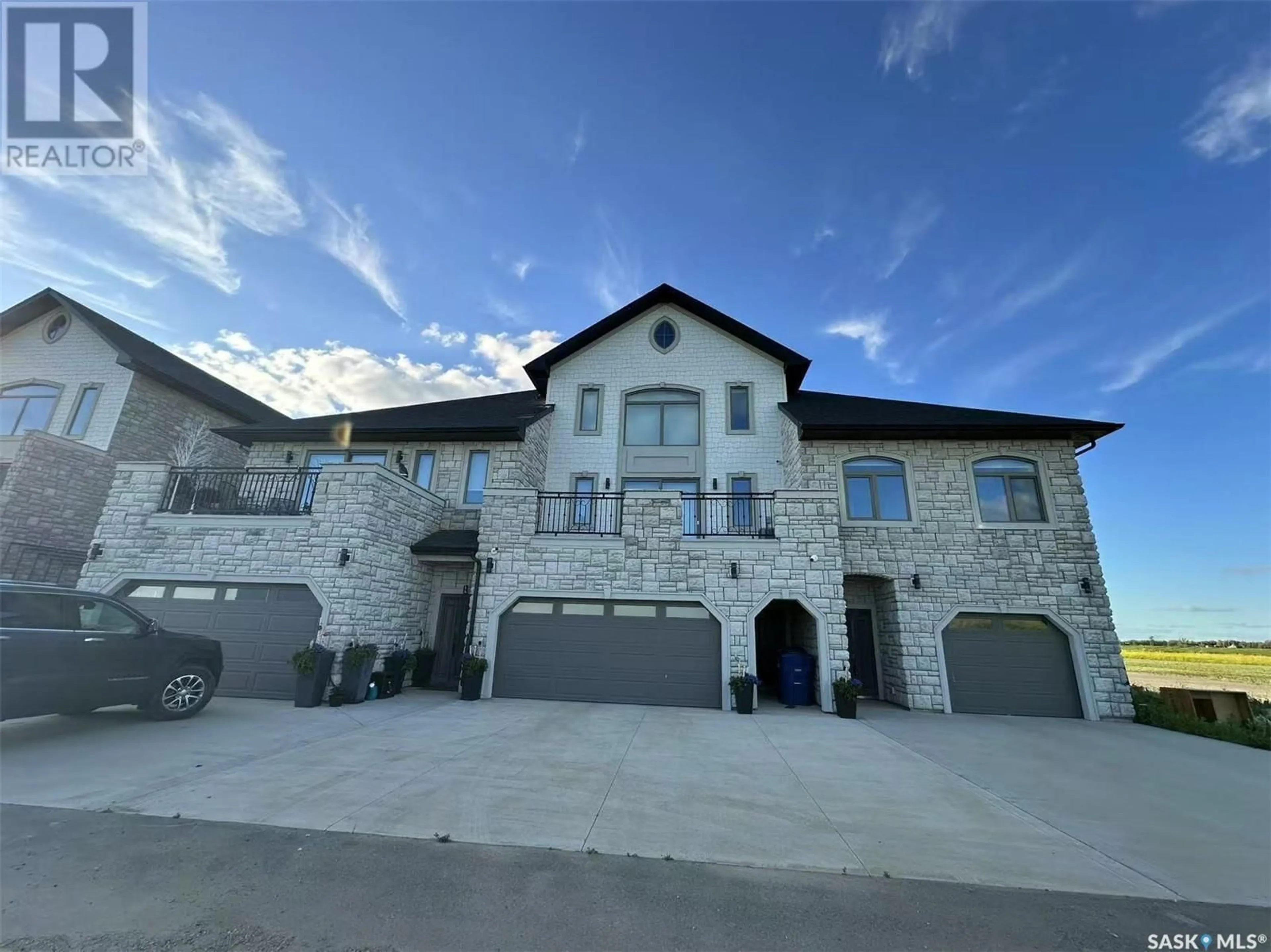 A pic from outside/outdoor area/front of a property/back of a property/a pic from drone, building for 2 298 PRAIRIE DAWN DRIVE, Dundurn Saskatchewan S0K1K0