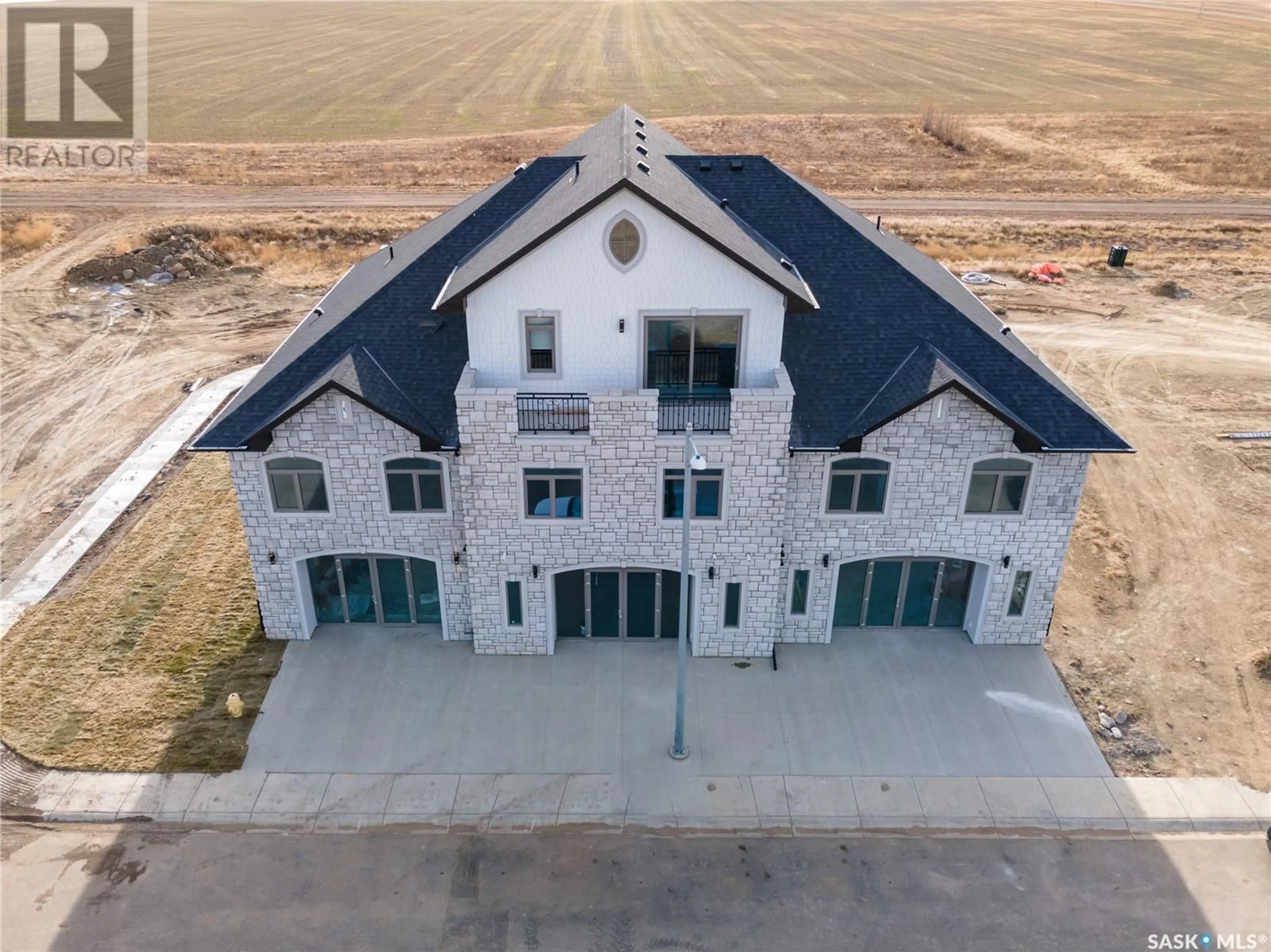 A pic from outside/outdoor area/front of a property/back of a property/a pic from drone, building for 2 298 PRAIRIE DAWN DRIVE, Dundurn Saskatchewan S0K1K0