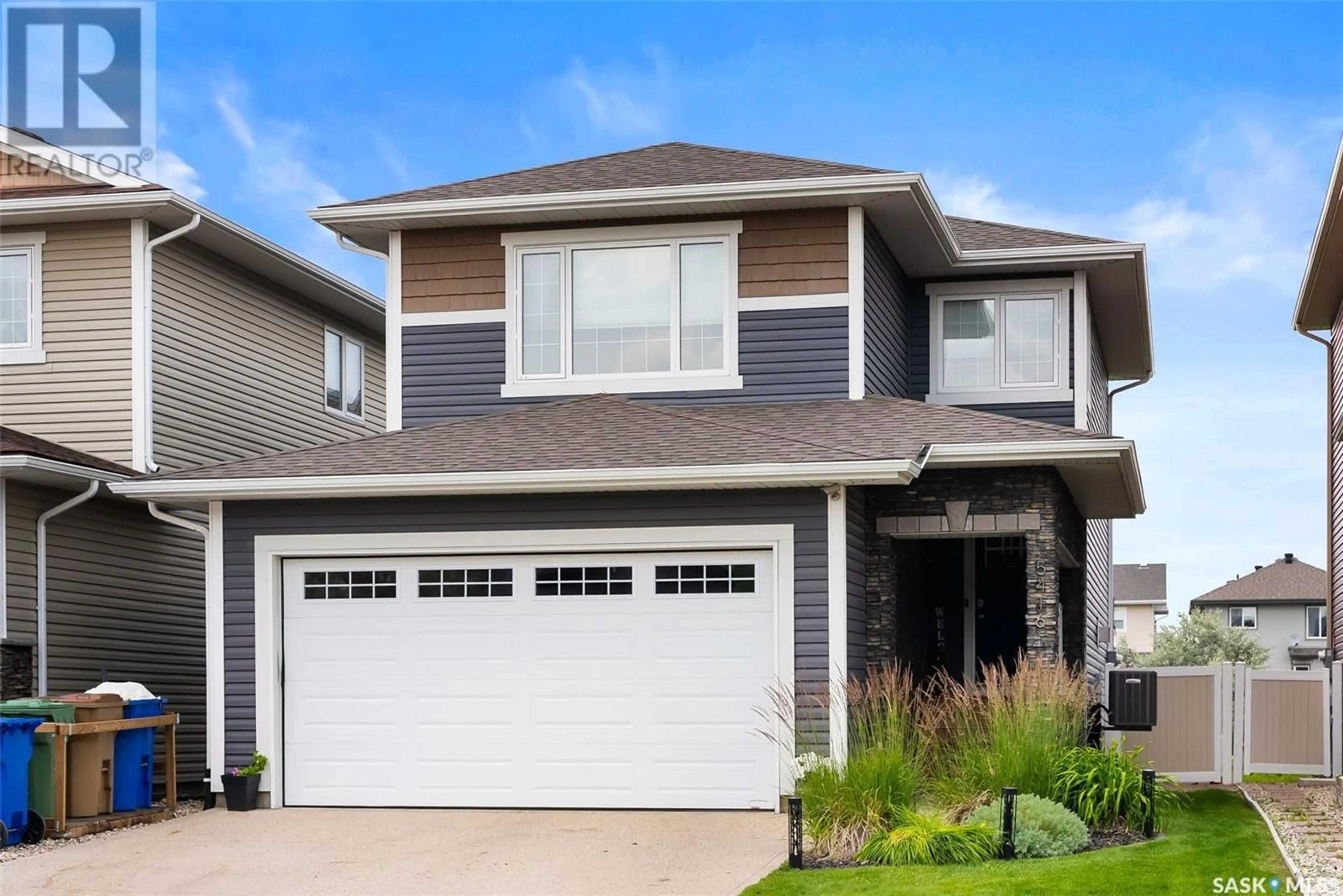 Home with vinyl exterior material, street for 5416 AERIAL CRESCENT, Regina Saskatchewan S4W0C9