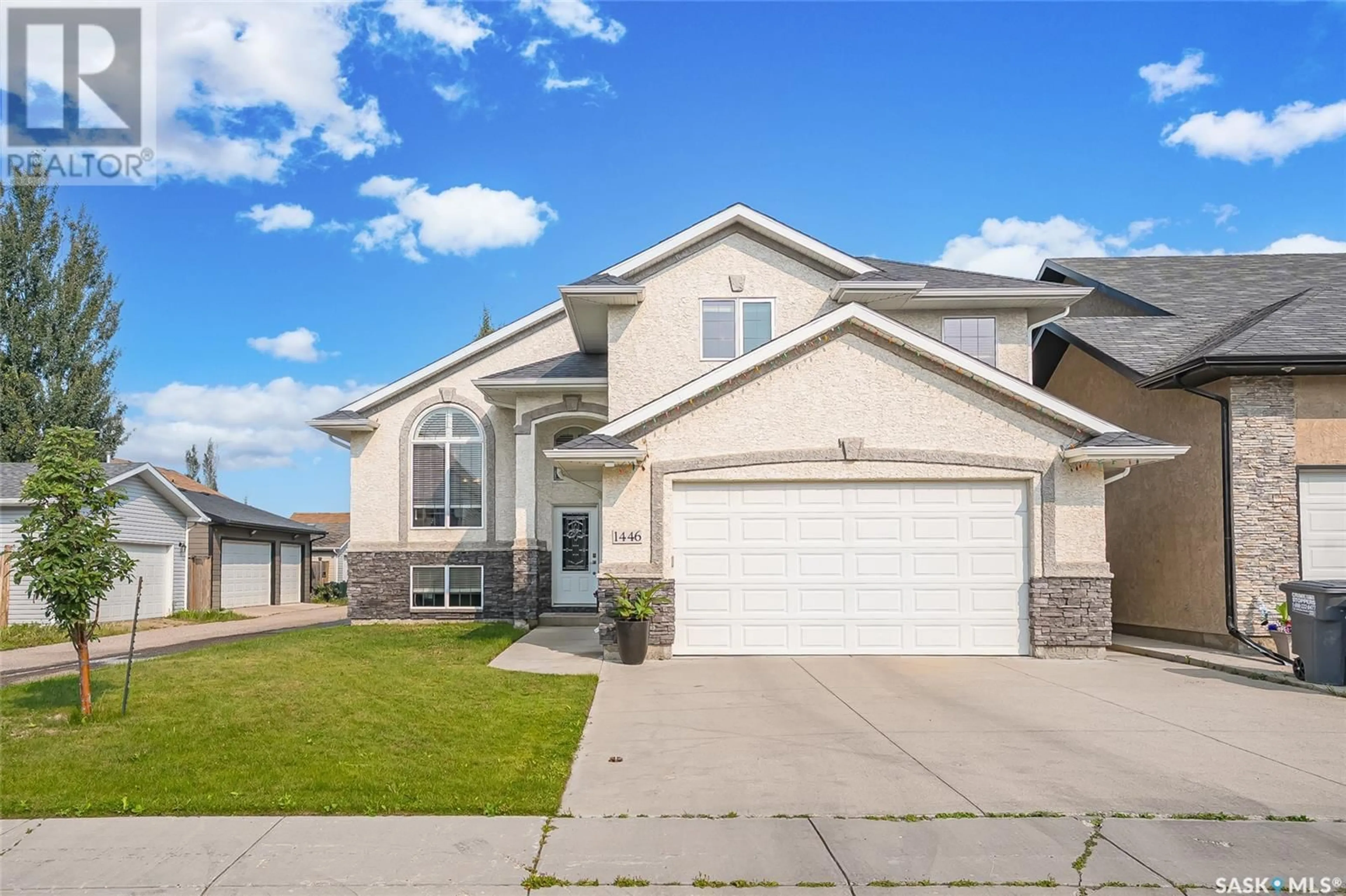 Home with vinyl exterior material, street for 1446 WILLOWGROVE COURT, Saskatoon Saskatchewan S7W0A9