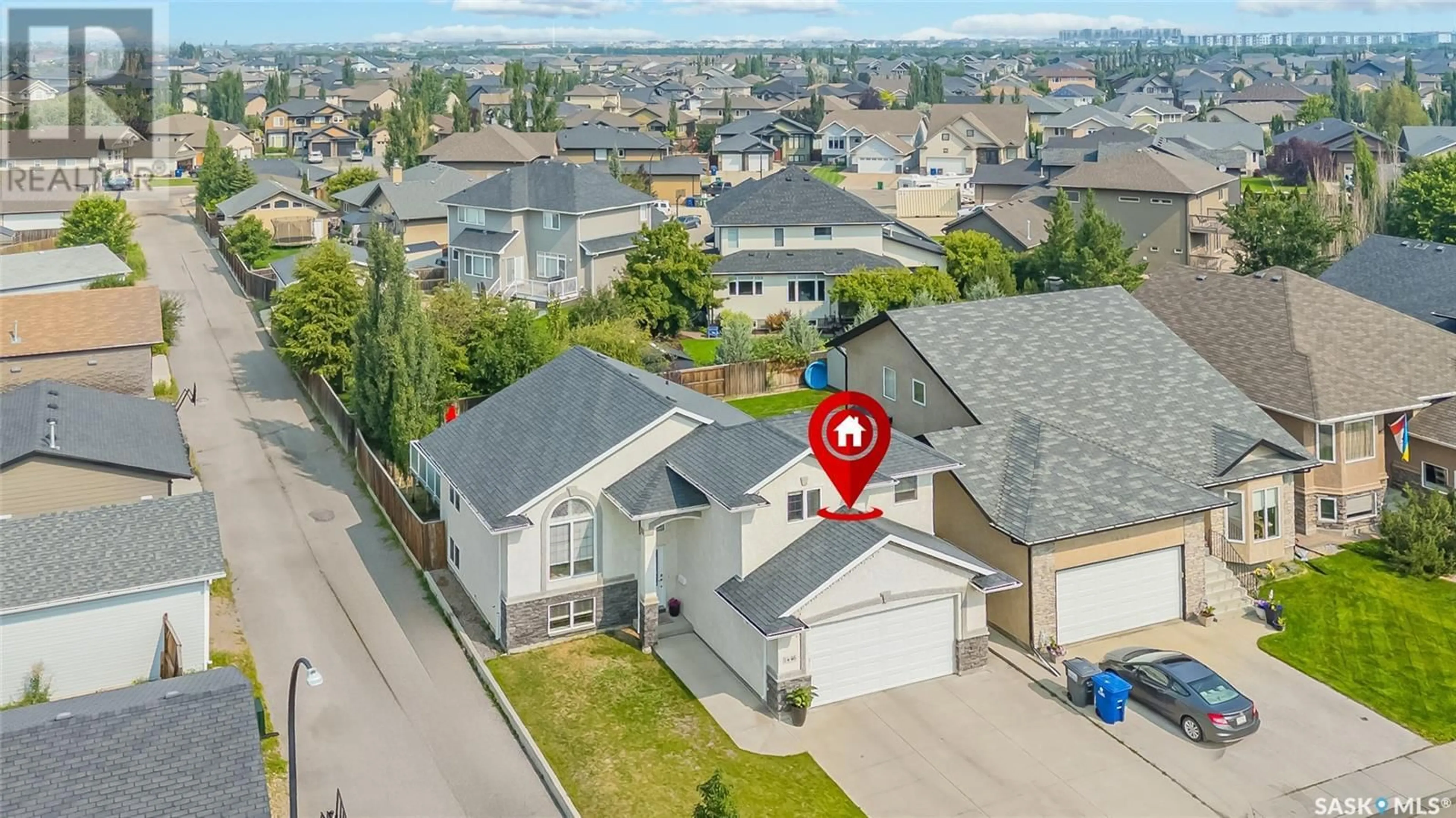 A pic from outside/outdoor area/front of a property/back of a property/a pic from drone, street for 1446 WILLOWGROVE COURT, Saskatoon Saskatchewan S7W0A9