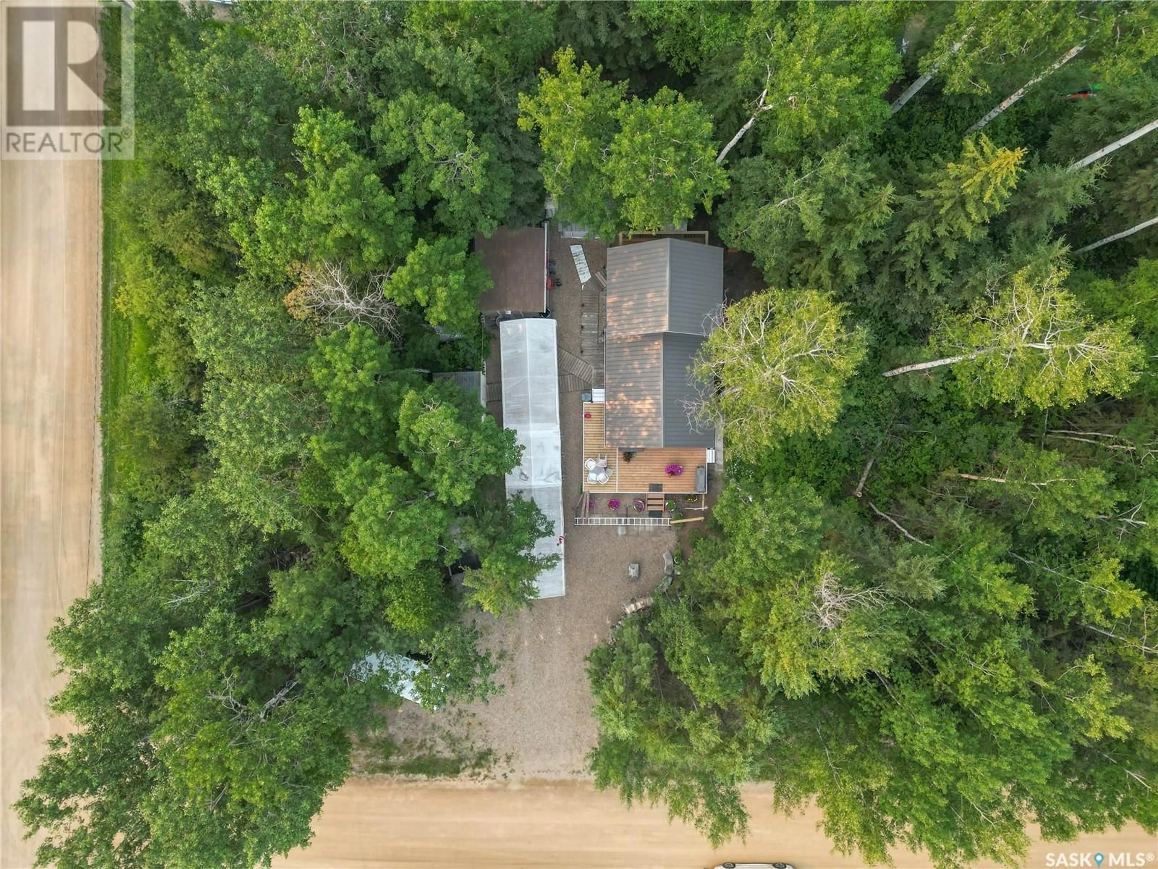 A pic from outside/outdoor area/front of a property/back of a property/a pic from drone, forest/trees view for 1004 KENNETH DRIVE, Paddockwood Rm No. 520 Saskatchewan S0J0N0