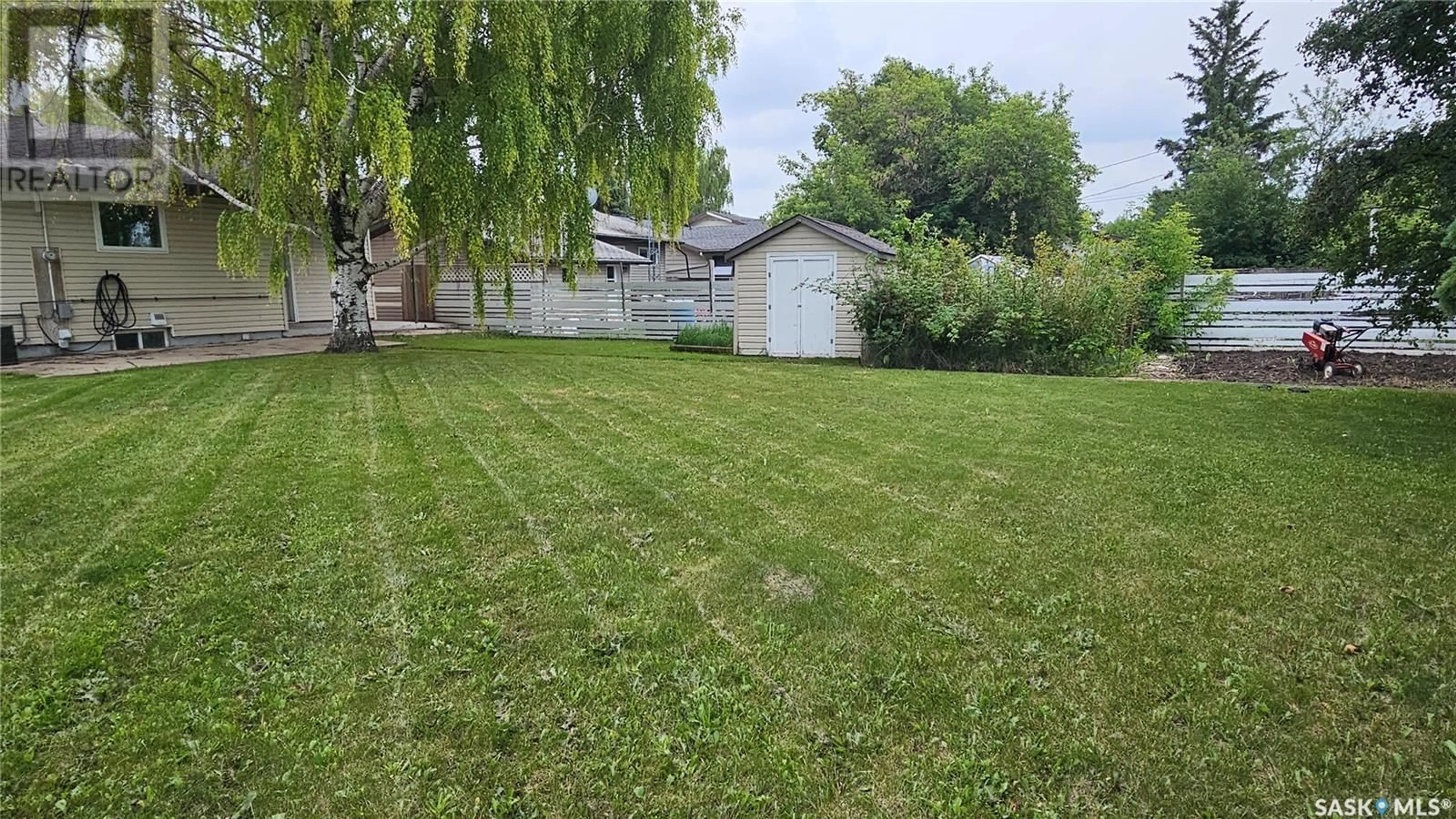 A pic from outside/outdoor area/front of a property/back of a property/a pic from drone, street for 1013 12TH STREET, Humboldt Saskatchewan S0K2A0