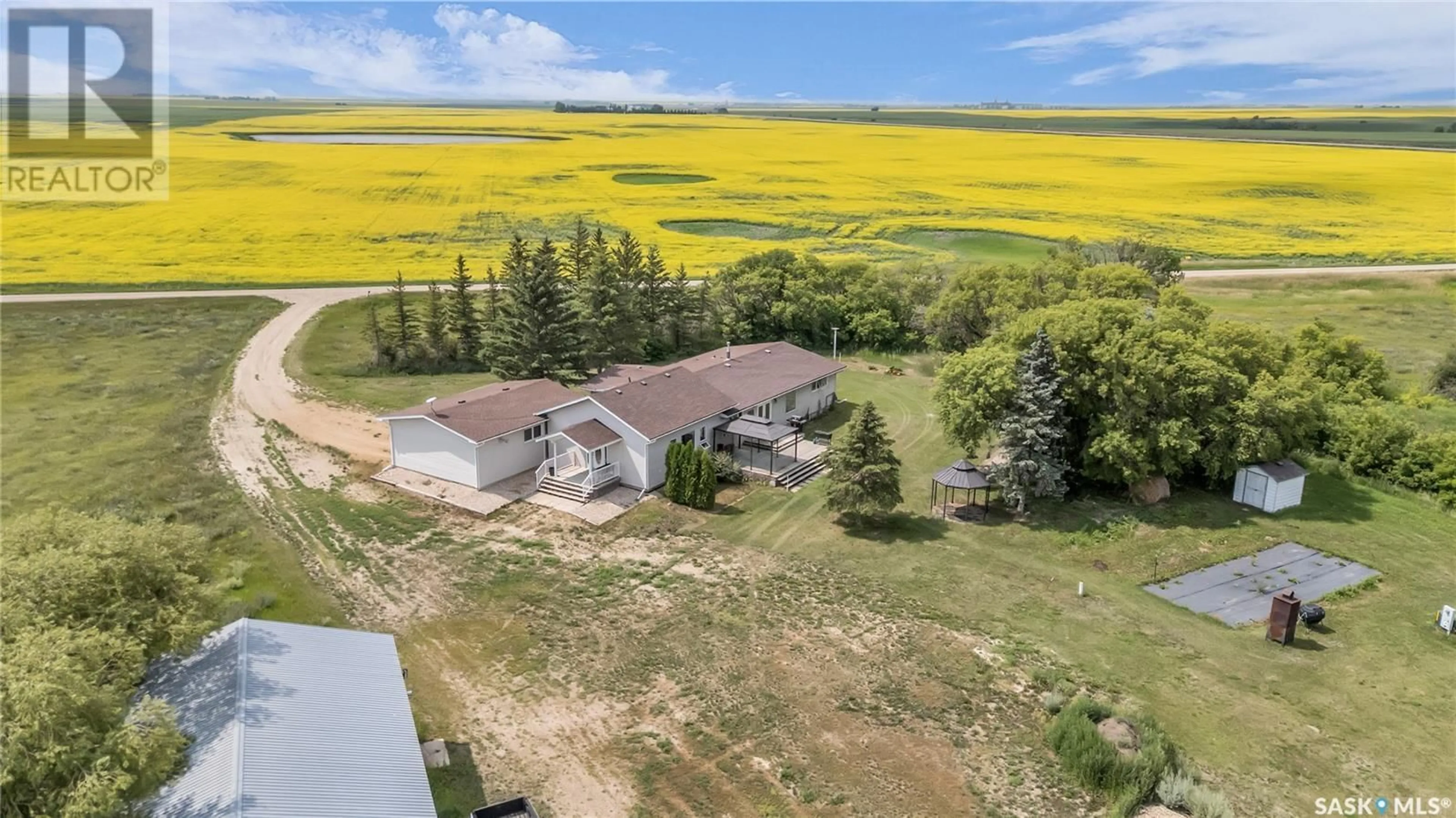 A pic from outside/outdoor area/front of a property/back of a property/a pic from drone, water/lake/river/ocean view for 209 NEW STEINBACH ROAD, Aberdeen Rm No. 373 Saskatchewan S0K0A0