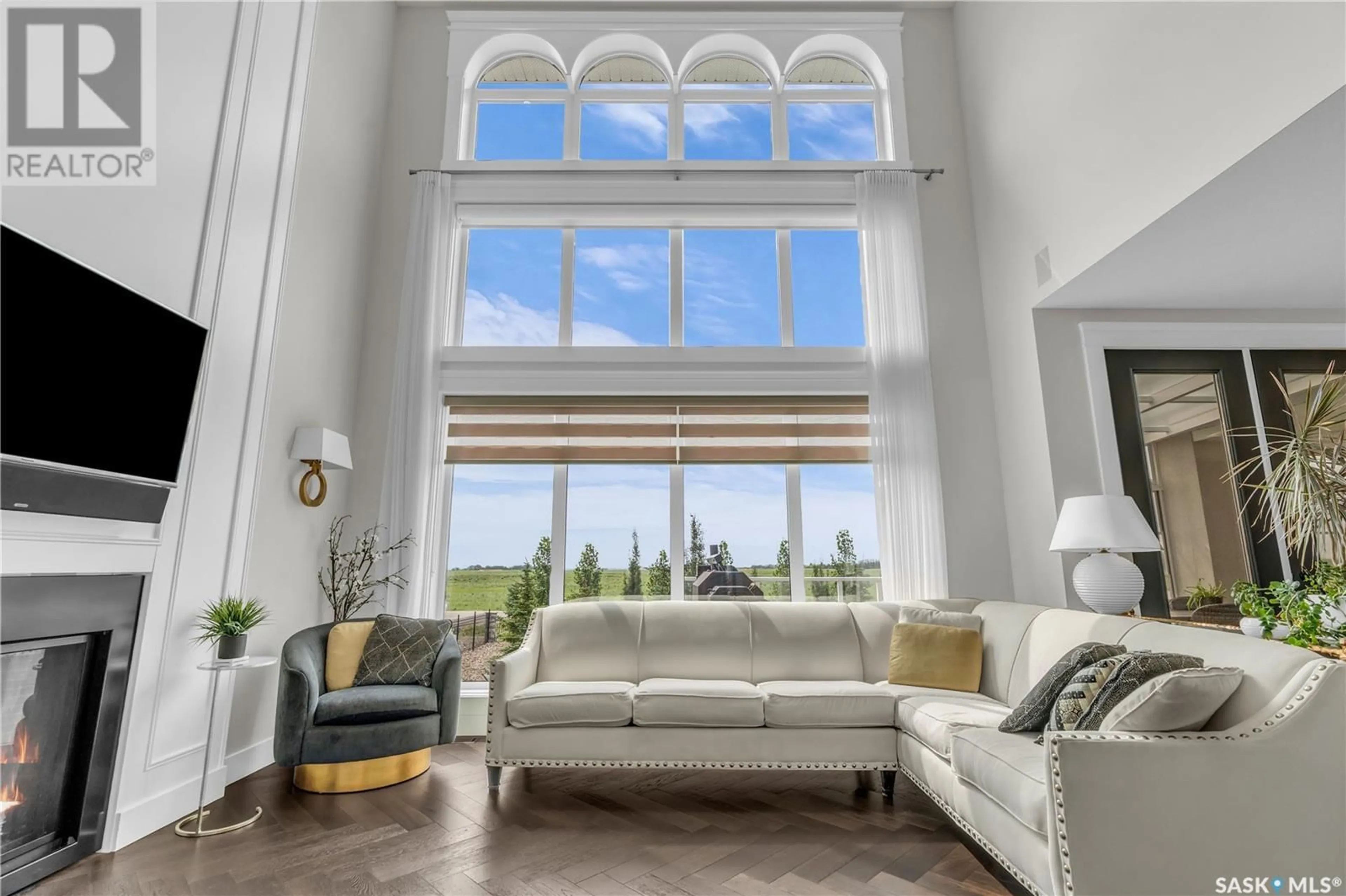 Living room with furniture, unknown for 301 SPRUCE CREEK CRESCENT, Pilot Butte Saskatchewan S4L5B1