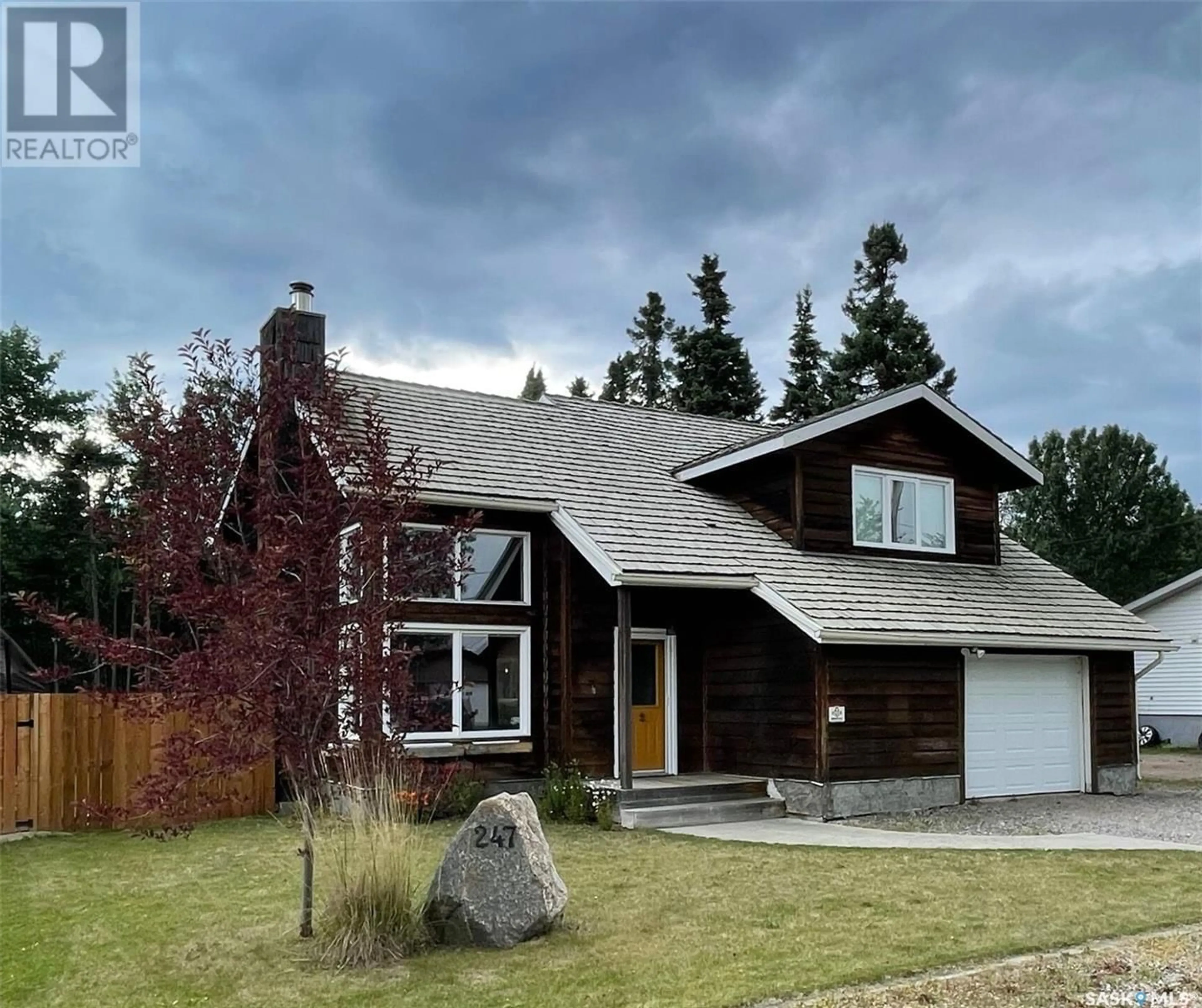 Home with vinyl exterior material, street for 247 DEHAVILLAND AVENUE, Air Ronge Saskatchewan S0J3G0